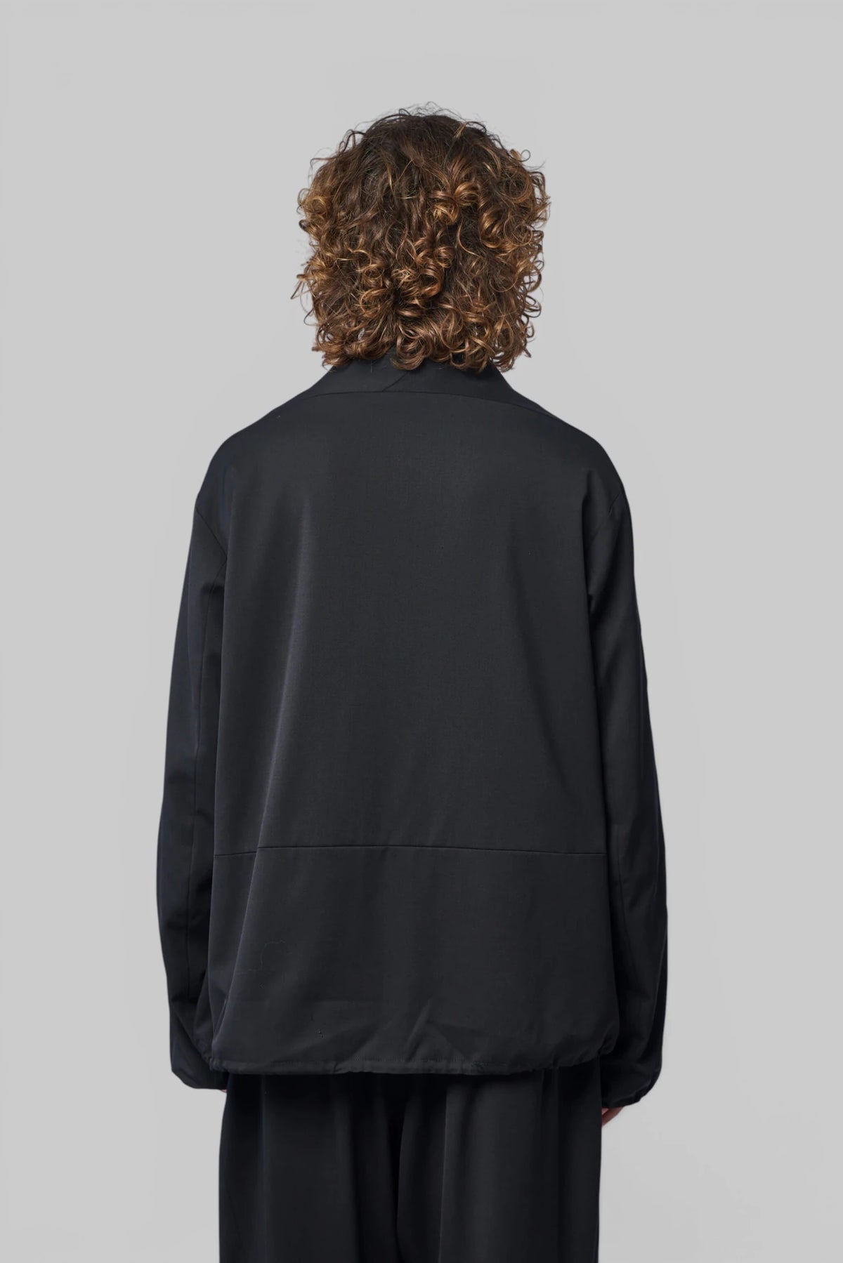 Back view of Kiko Kostadinov Erdiko Jacket long sleeves