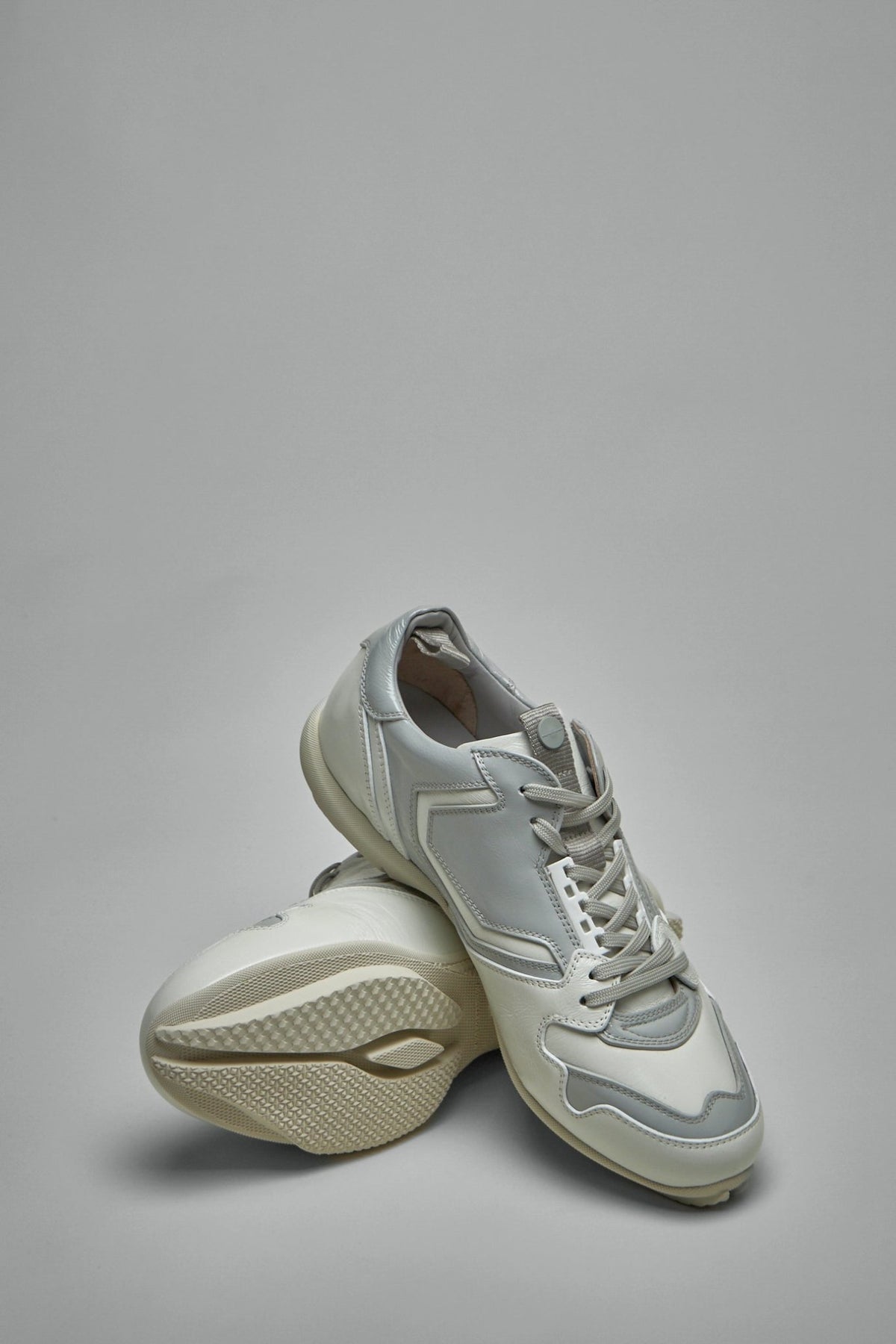 Full product view of Kiko Kostadinov Ostro shoes on neutral background