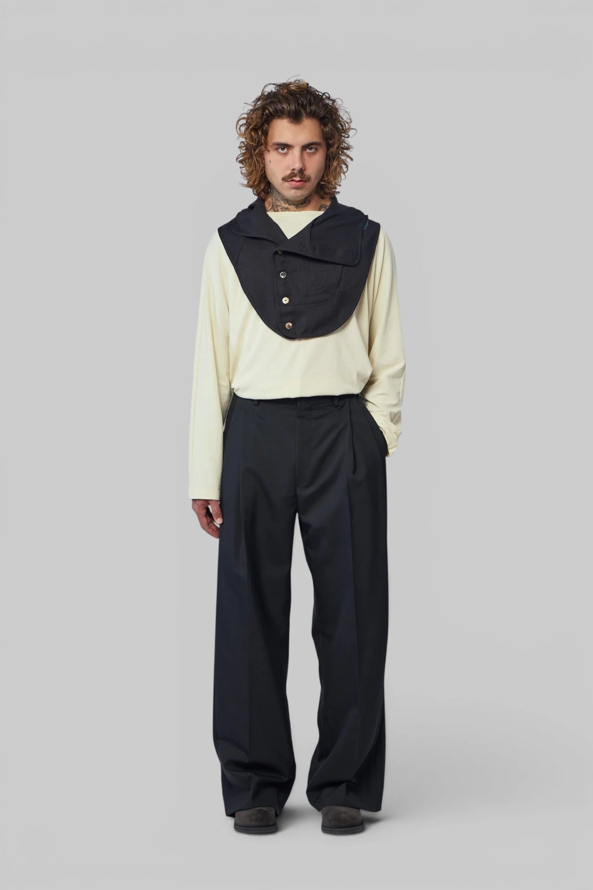 Close-up of folded neck design on Kiko Kostadinov Tomelilla Top