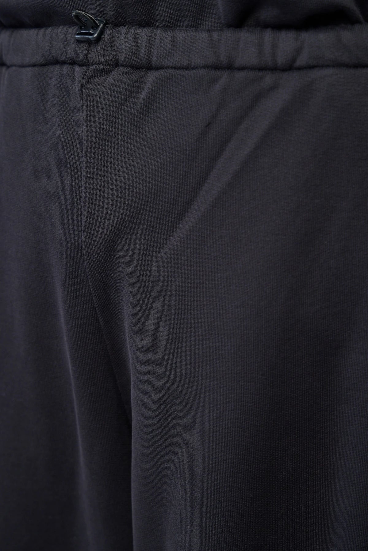 Detail shot of cotton fabric texture on Kiko Kostadinov pants