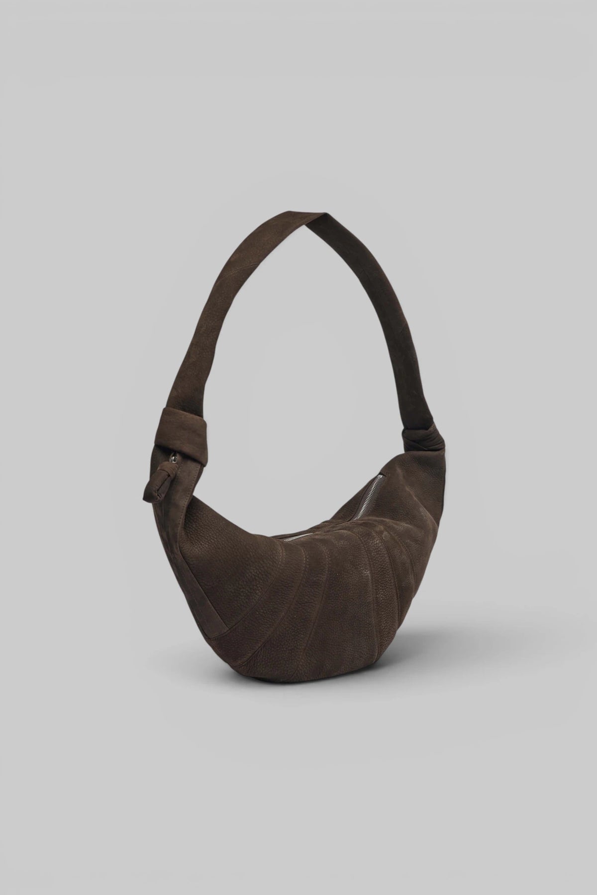 Close-up of chunky shoulder strap on Lemaire crossbody bag