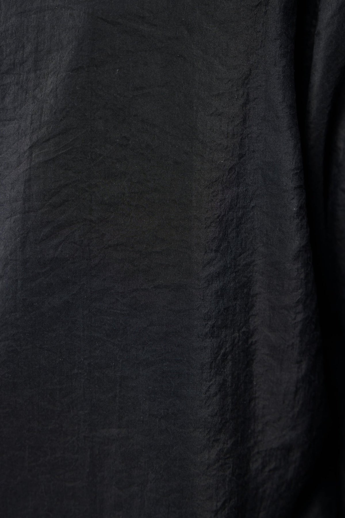 Back view of Lemaire long shirt showing straight hemline