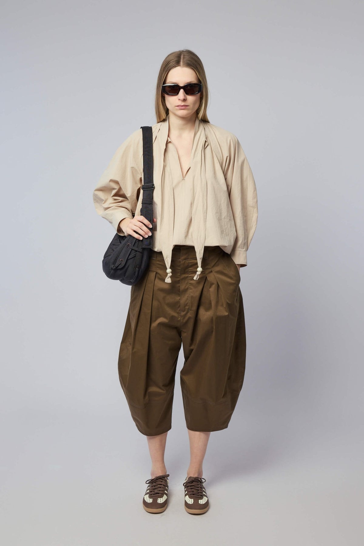 Full styling look featuring Lemaire Volume Bermudas with accessories