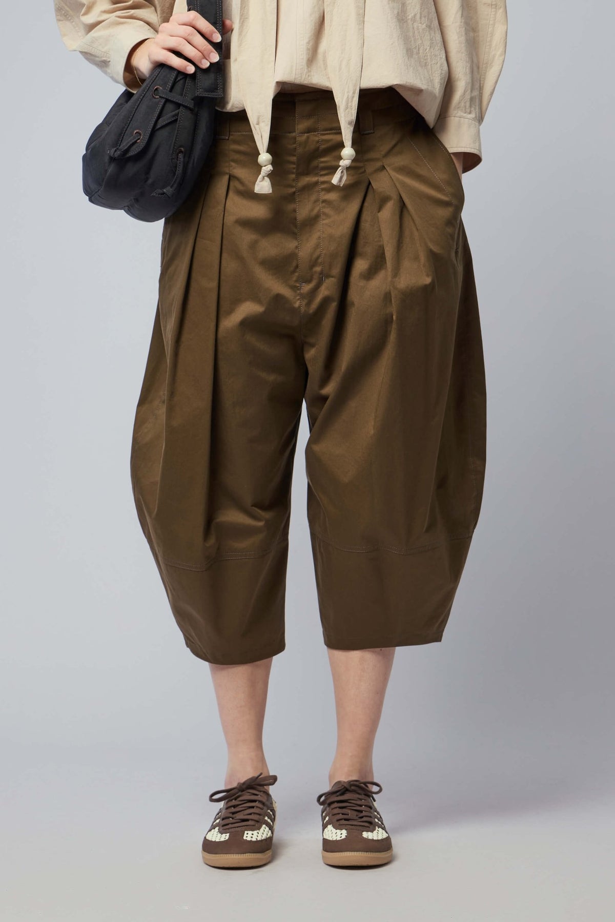 Lemaire cargo pants in premium cotton featuring relaxed bermuda silhouette