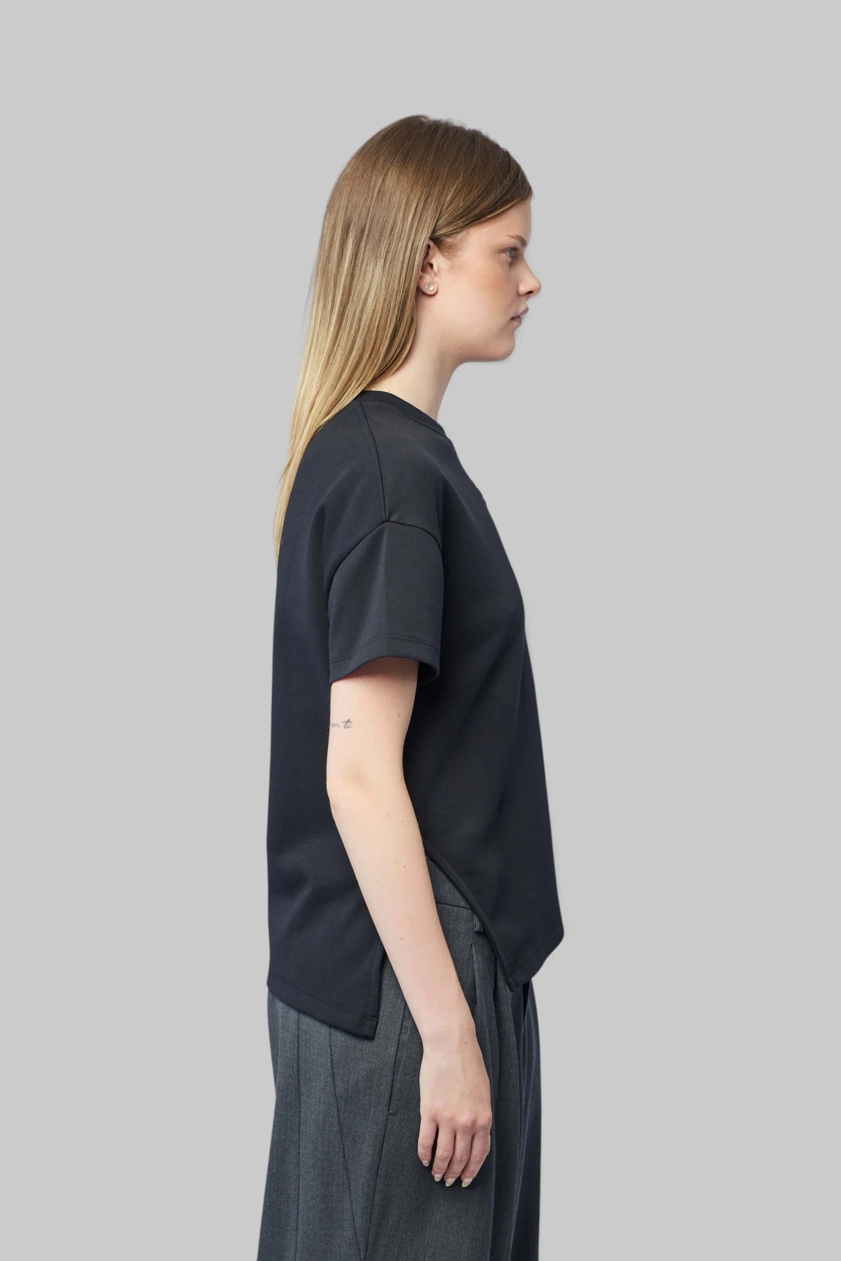Loewe Asymmetric T-Shirt styled with tailored trousers