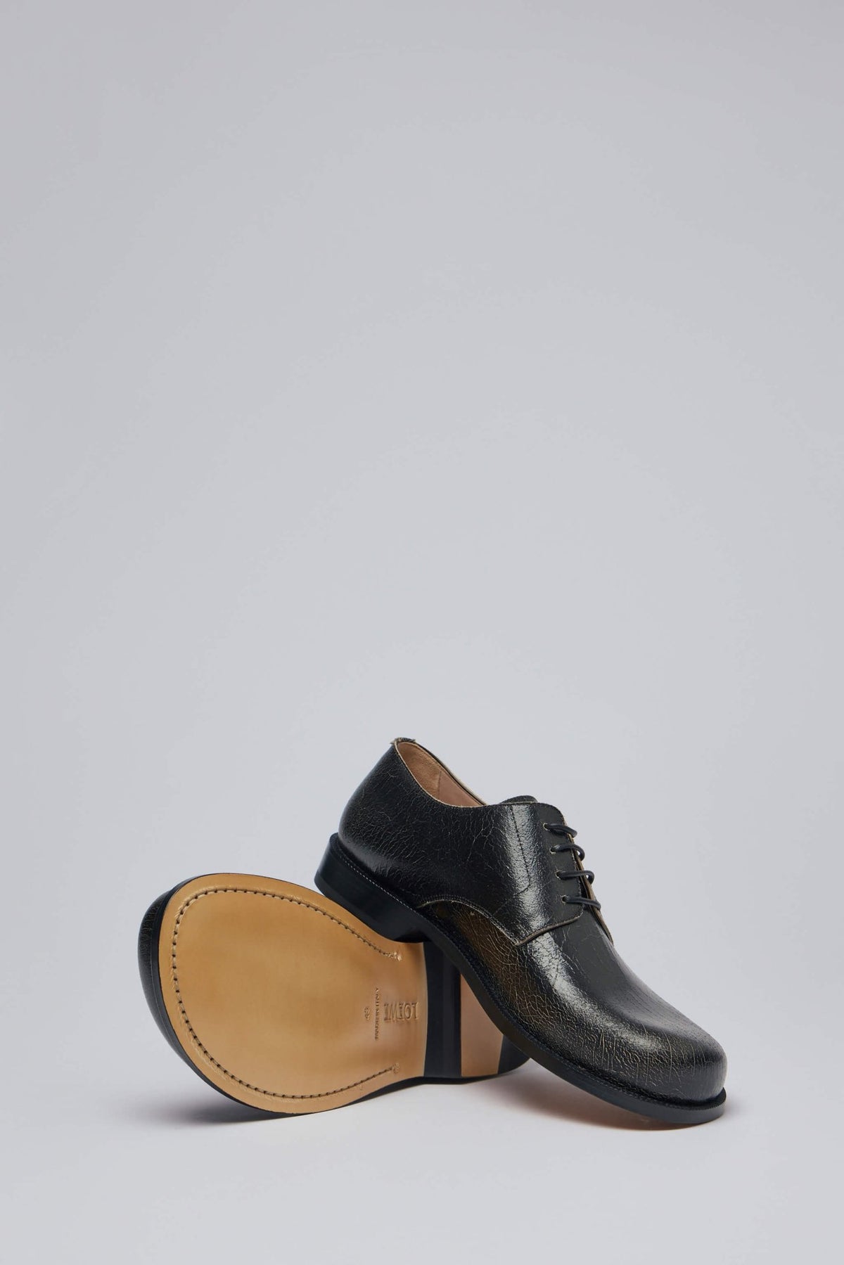 Close-up of Loewe branding and craftsmanship details on Campo Derby