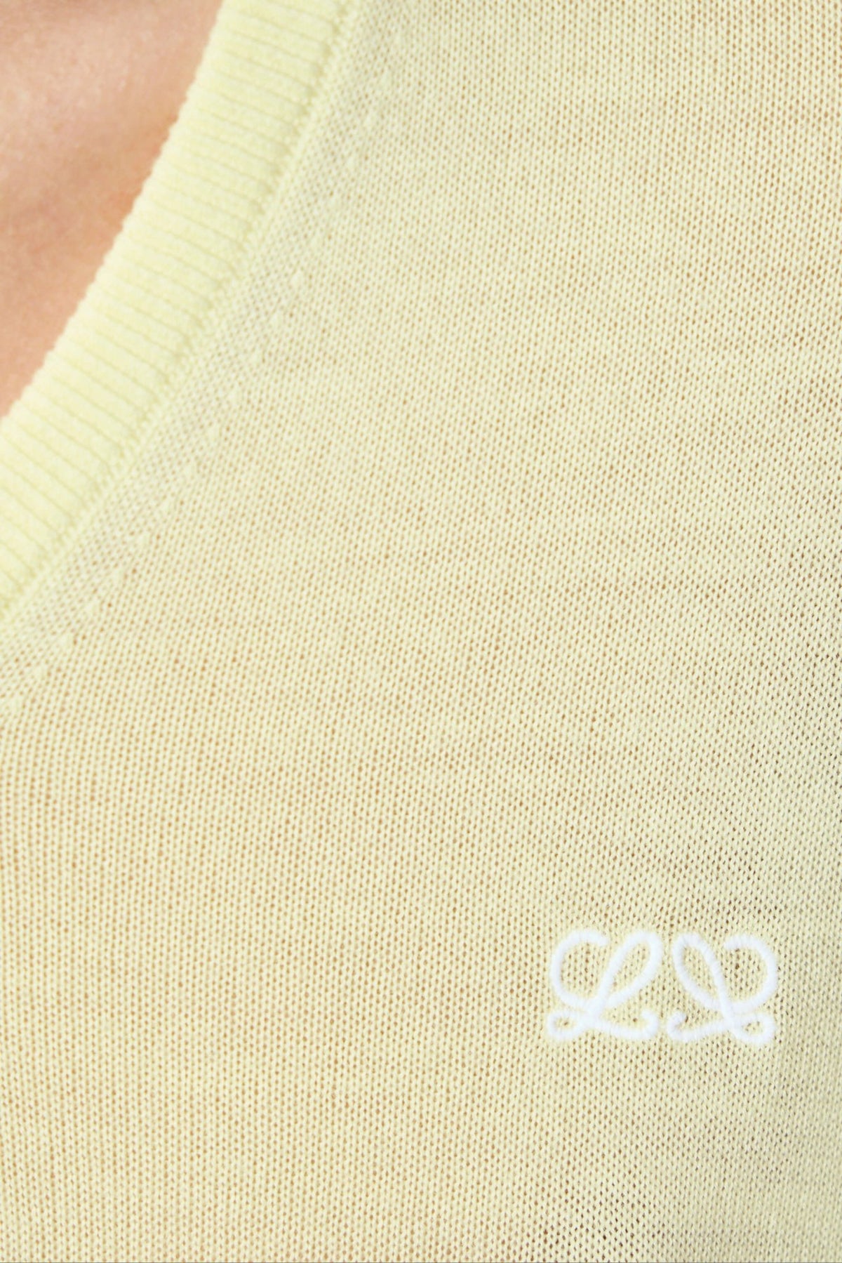 Detail shot of draped construction on luxury wool sweater
