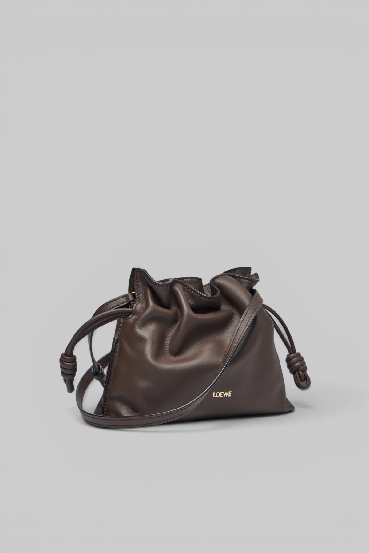 Side profile of Loewe Flamenco Clutch Mini in calfskin leather