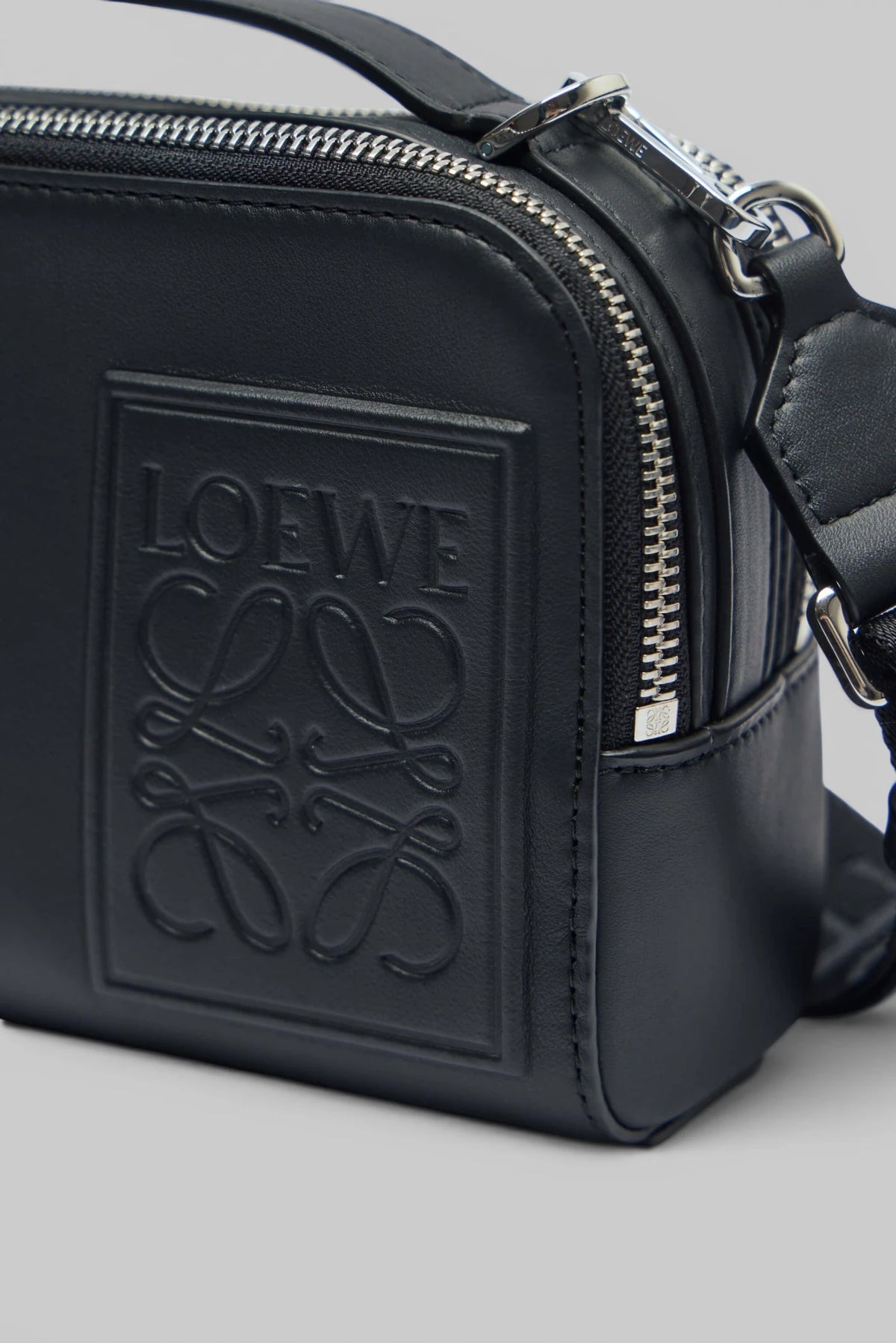 Loewe Patch Camera Bag Mini styled as a crossbody accessory