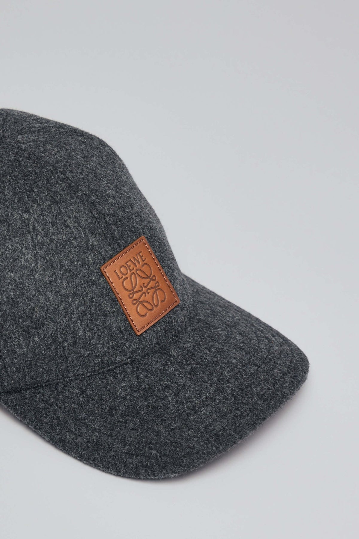 Loewe patch cap styled for contemporary luxury fashion