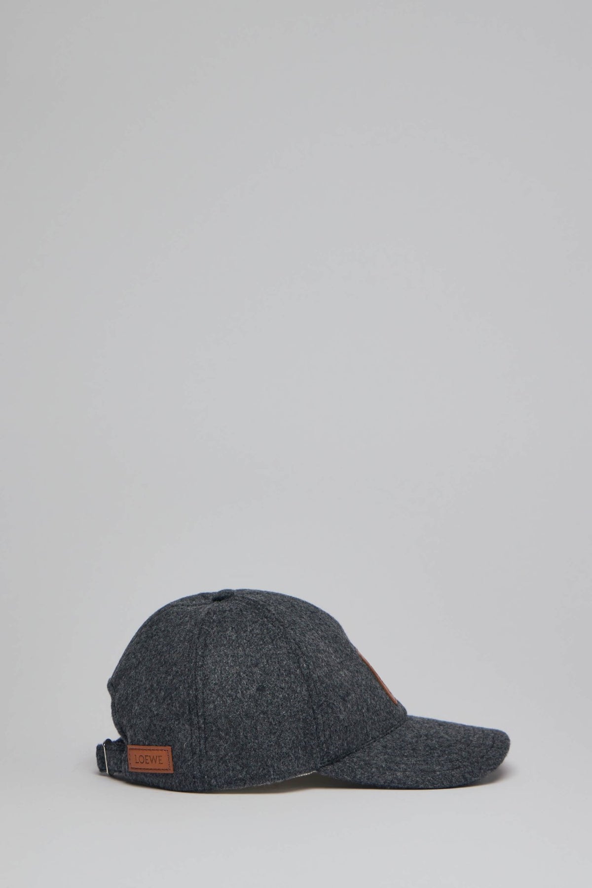 Close-up of Loewe logo patch on premium wool cap