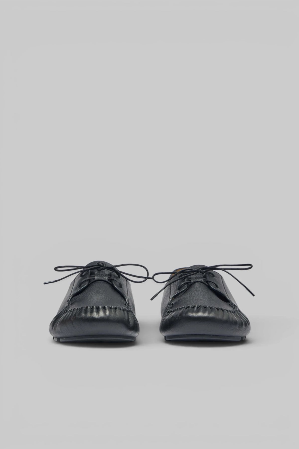 Side profile of Loewe Rambla Boatshoe showing lace-up front