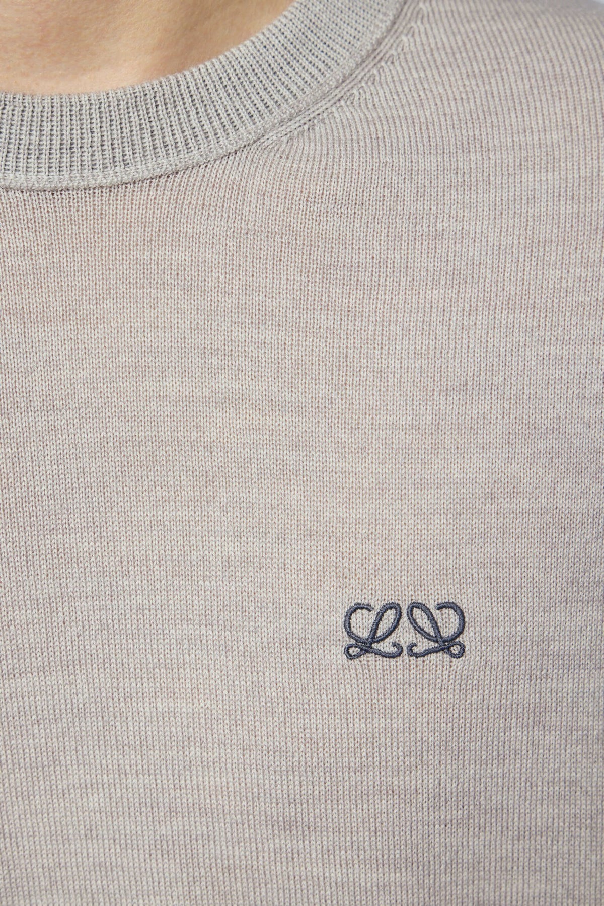 Model wearing Loewe crew neck sweater in light grey wool, view 7