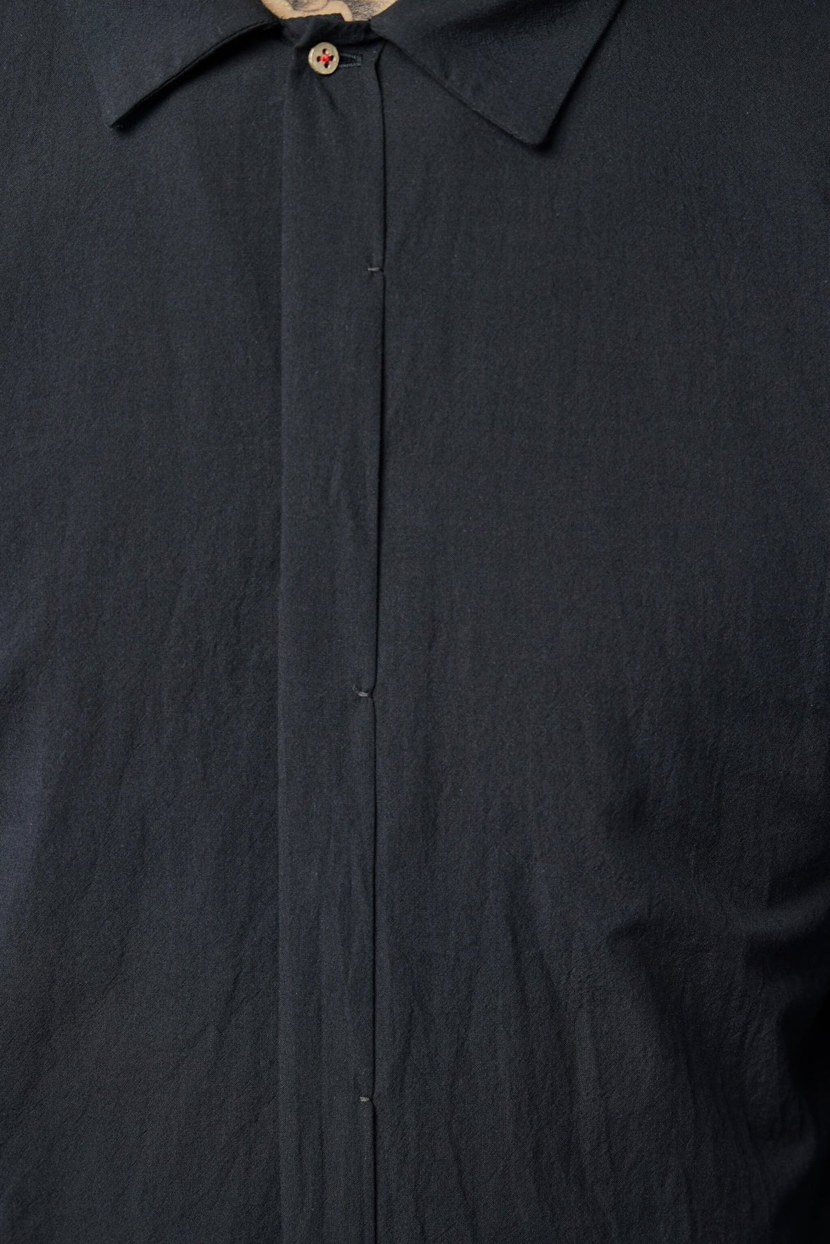 Back view highlighting the shirt's contemporary silhouette