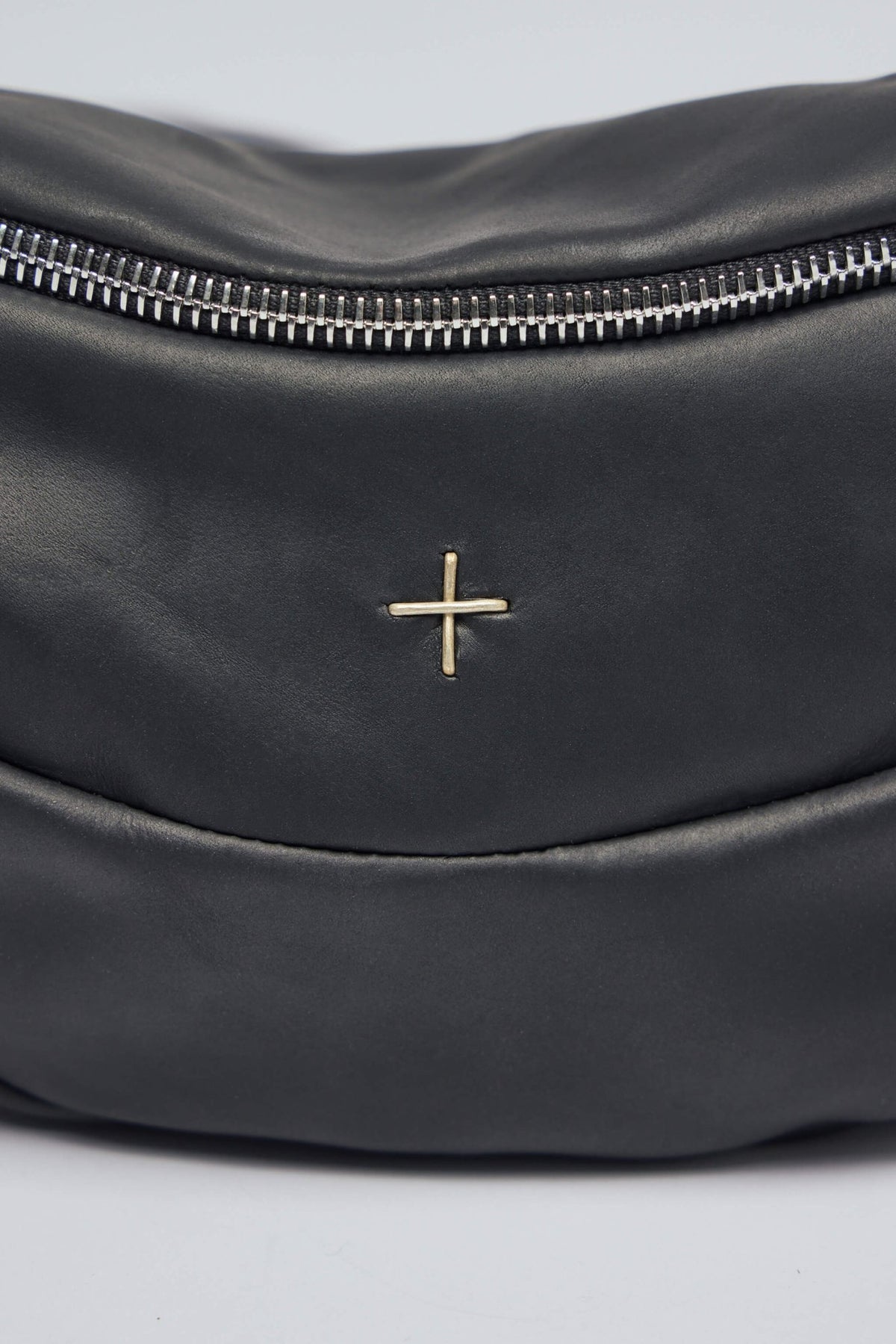 Detail shot of premium cow leather texture and craftsmanship