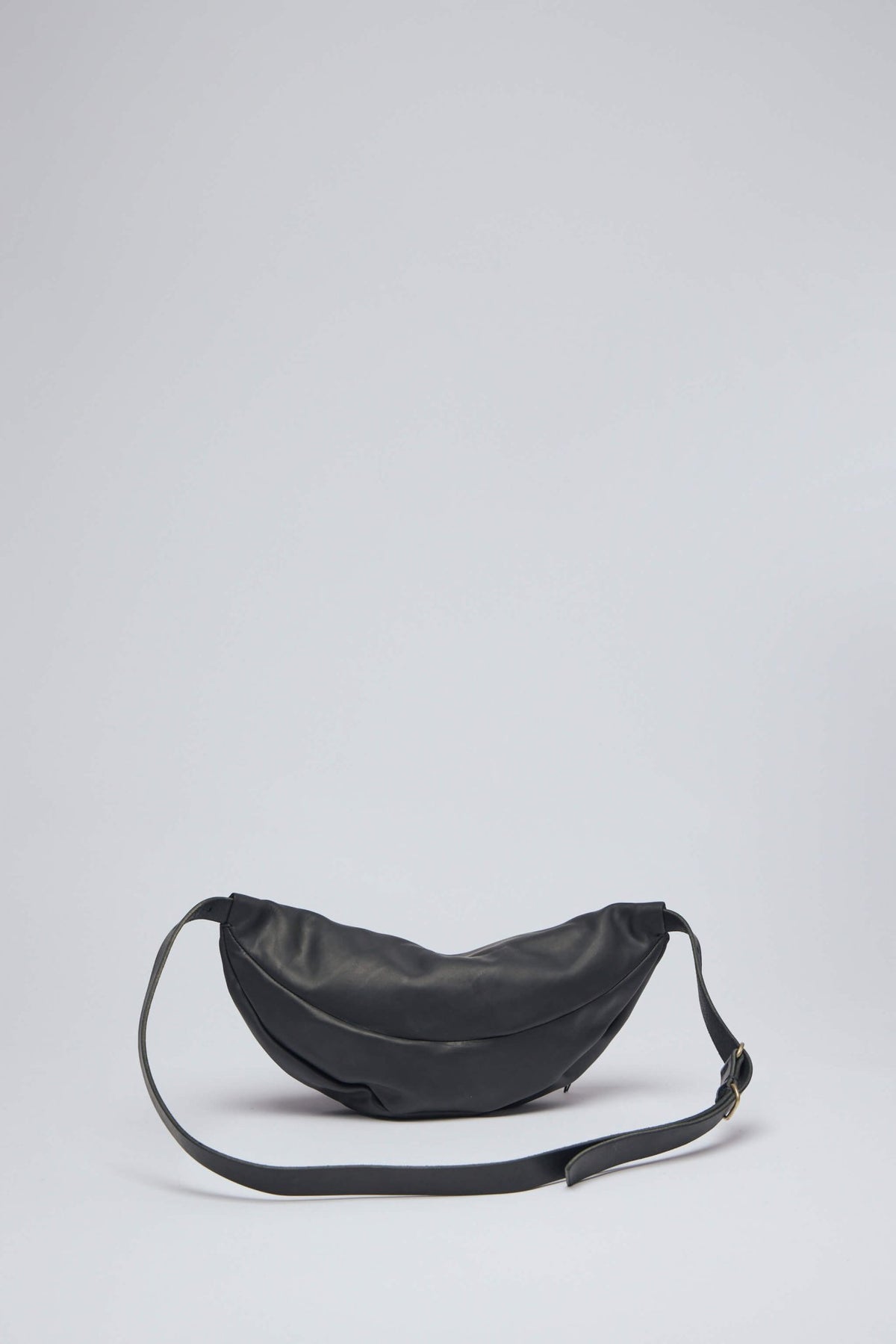 Model wearing M.A+ Medium Slice Belt Bag demonstrating crossbody styling