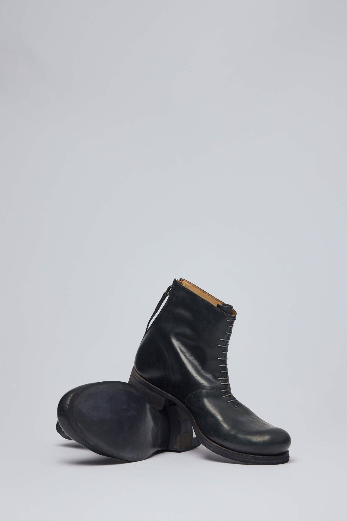 Detail shot of premium horse leather craftsmanship and finishing