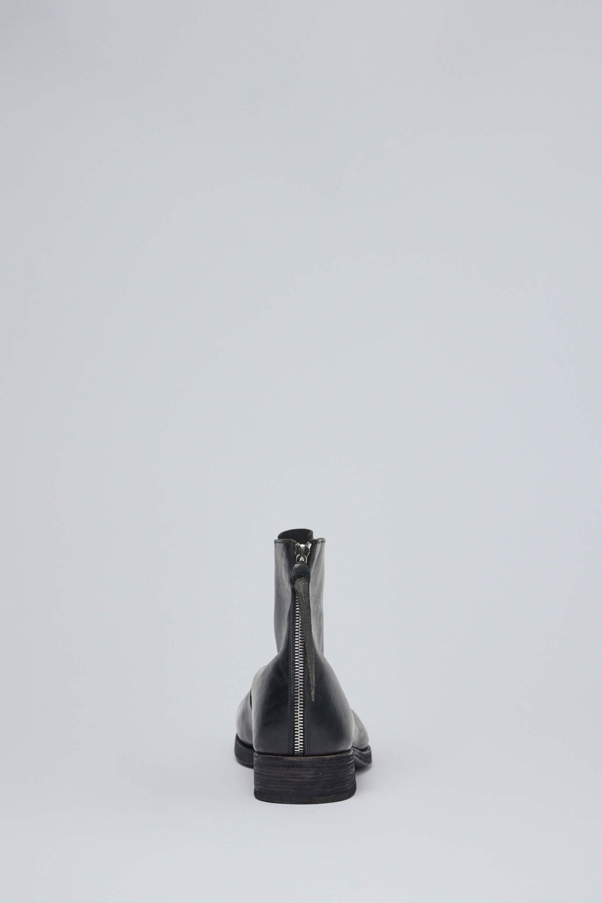 Full boot silhouette displaying avant-garde design aesthetic