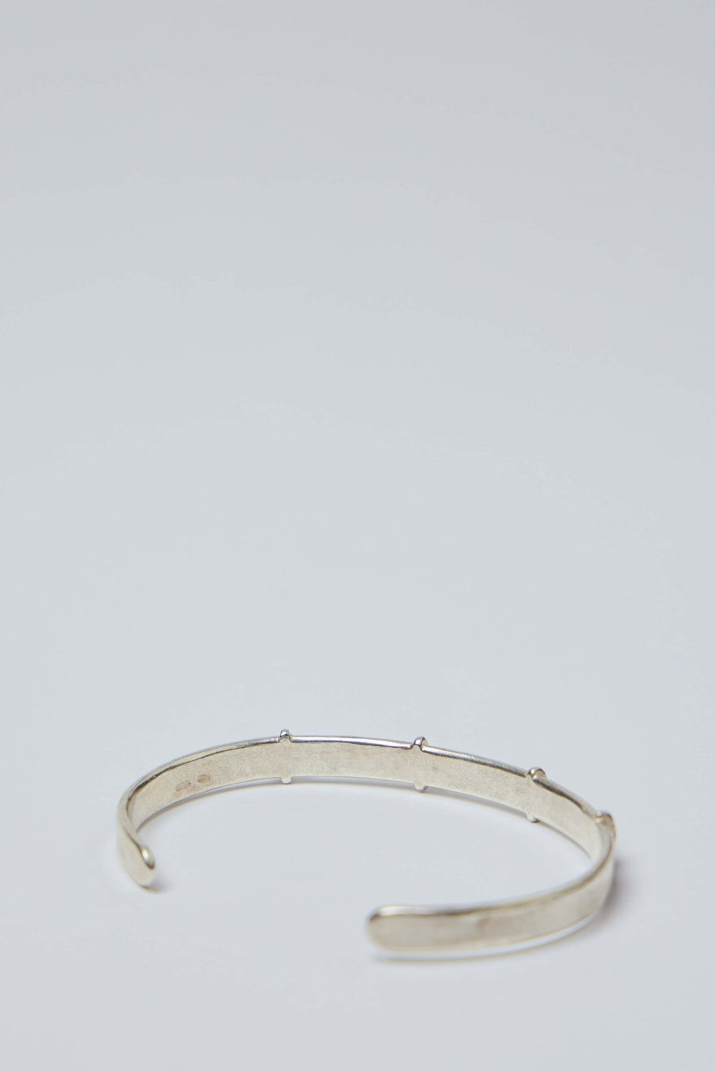 M.A+ Maurizio Amadei - Thin Silver Stitched Cross Silver Bangle - LABELS