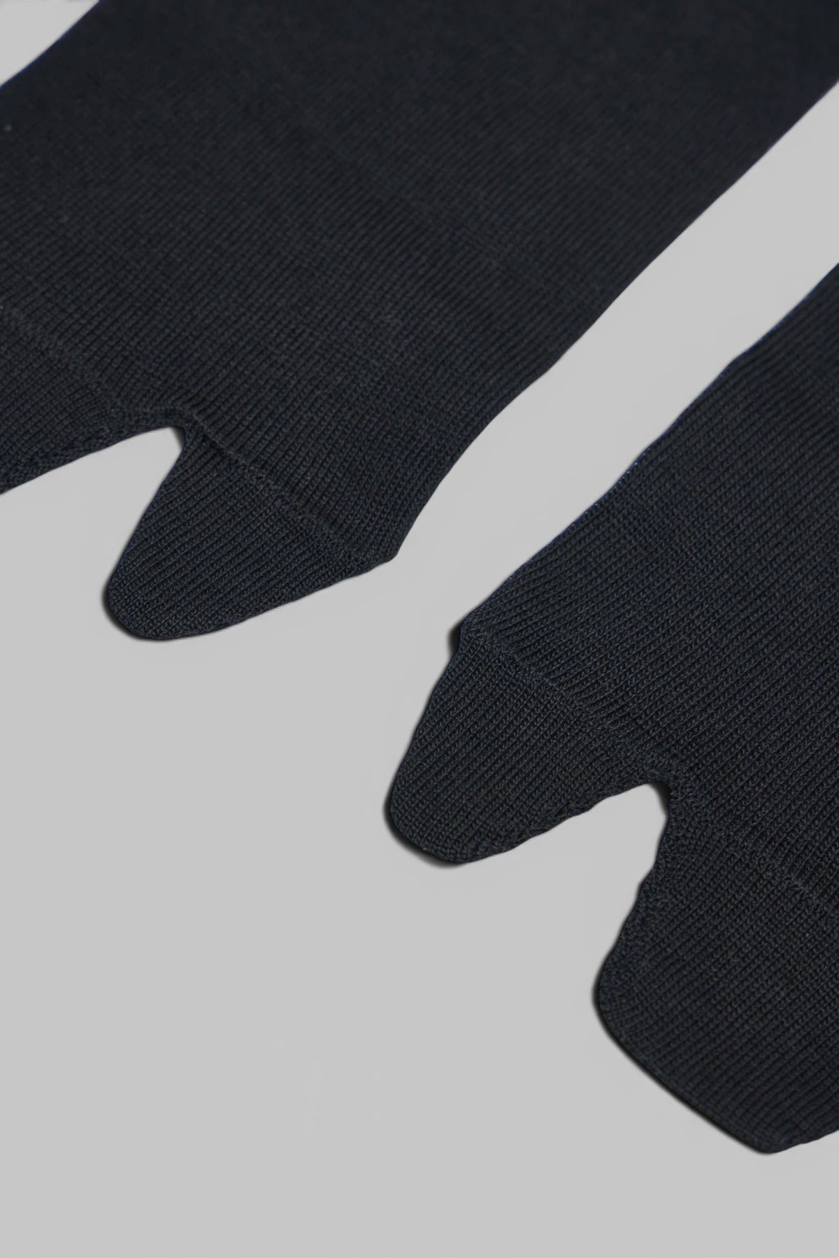 Maison Margiela Bootleg socks styled with footwear