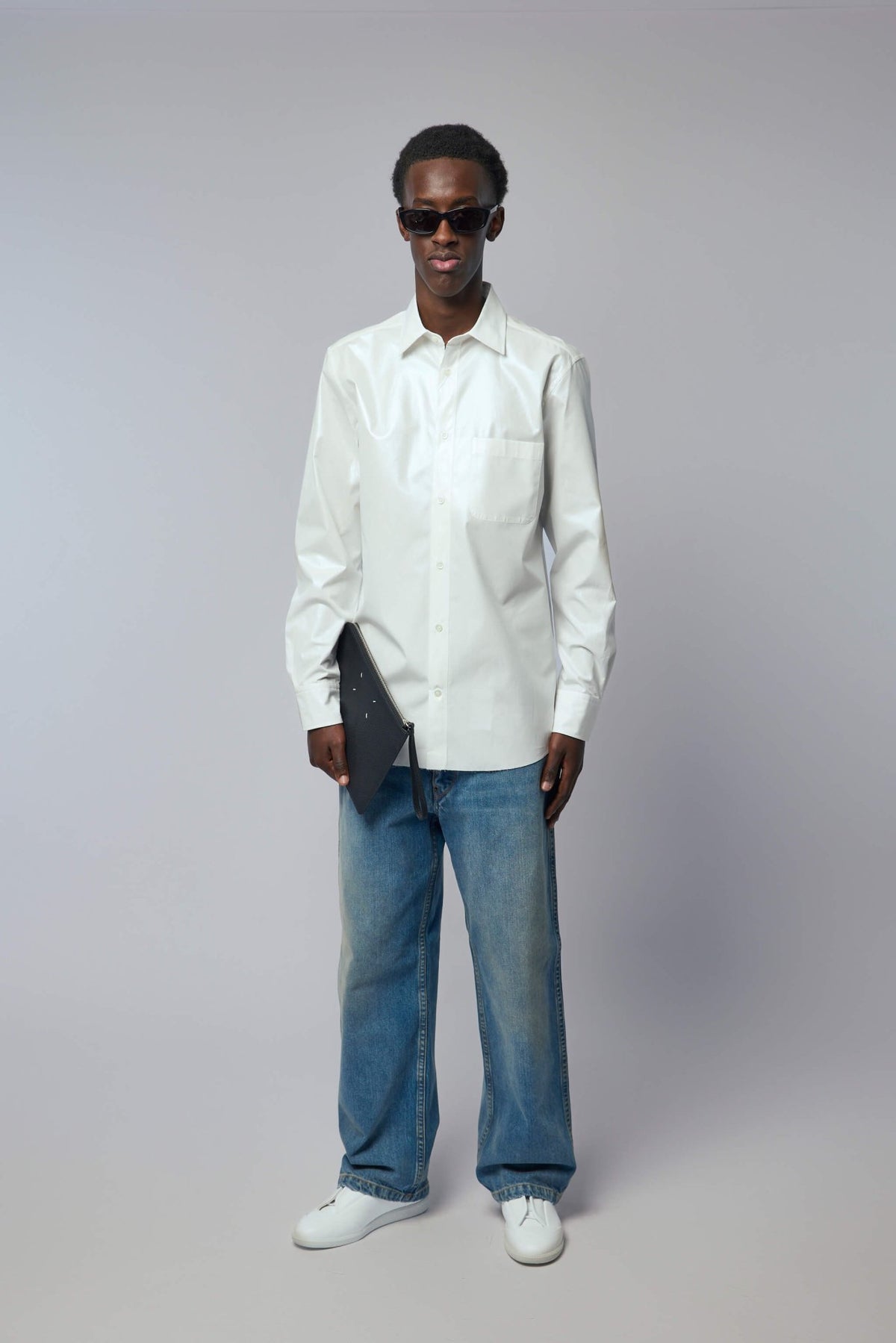 Close-up of premium cotton denim construction and finishing details, view 7
