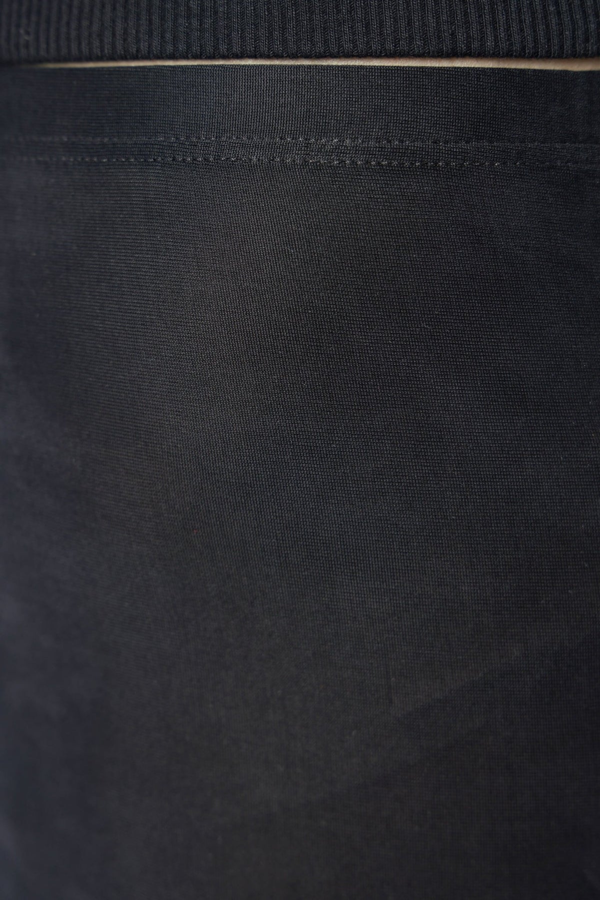 Full length view of model wearing black designer leggings
