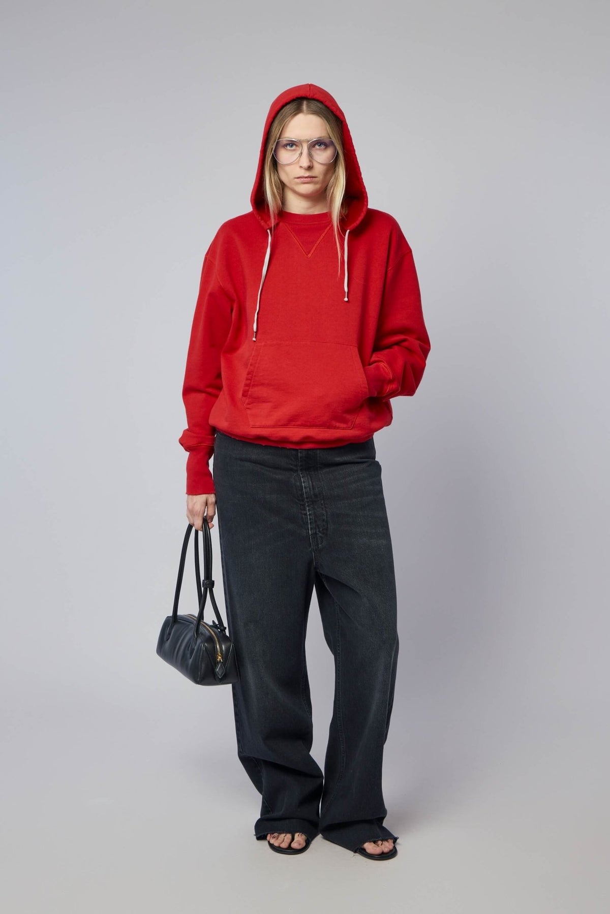Full outfit styling with wide-leg pants and accessories