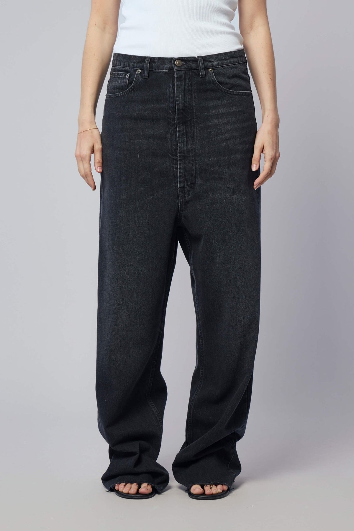 Model wearing cotton wide-leg pants showing relaxed silhouette