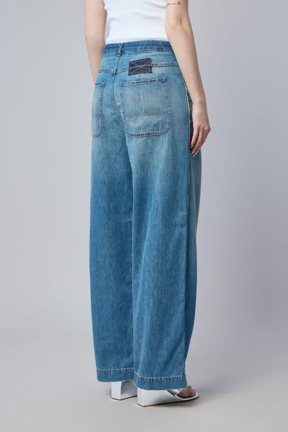 Back view of Maison Margiela wide leg jeans showing the sophisticated cut
