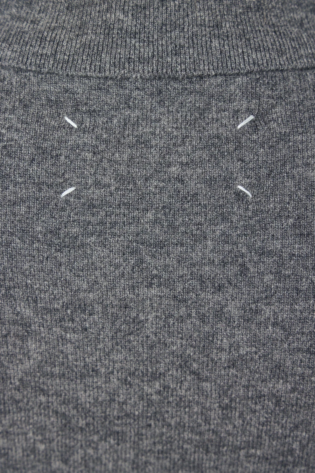 Full look styling of Maison Margiela knitwear polo shirt