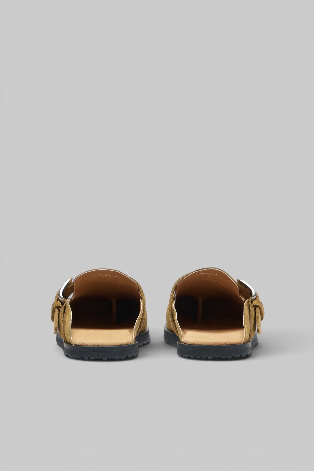 Maison Margiela sandals showing contrast black sole