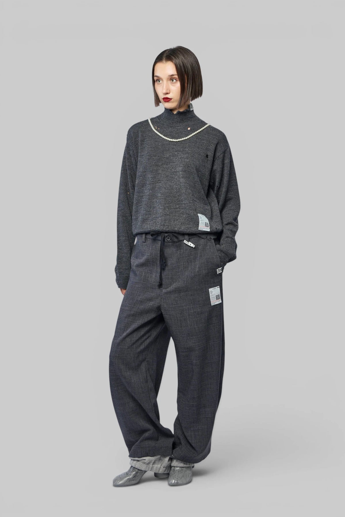 Maison Mihara Yasuhiro Wide-Leg Pants side profile showing relaxed silhouette