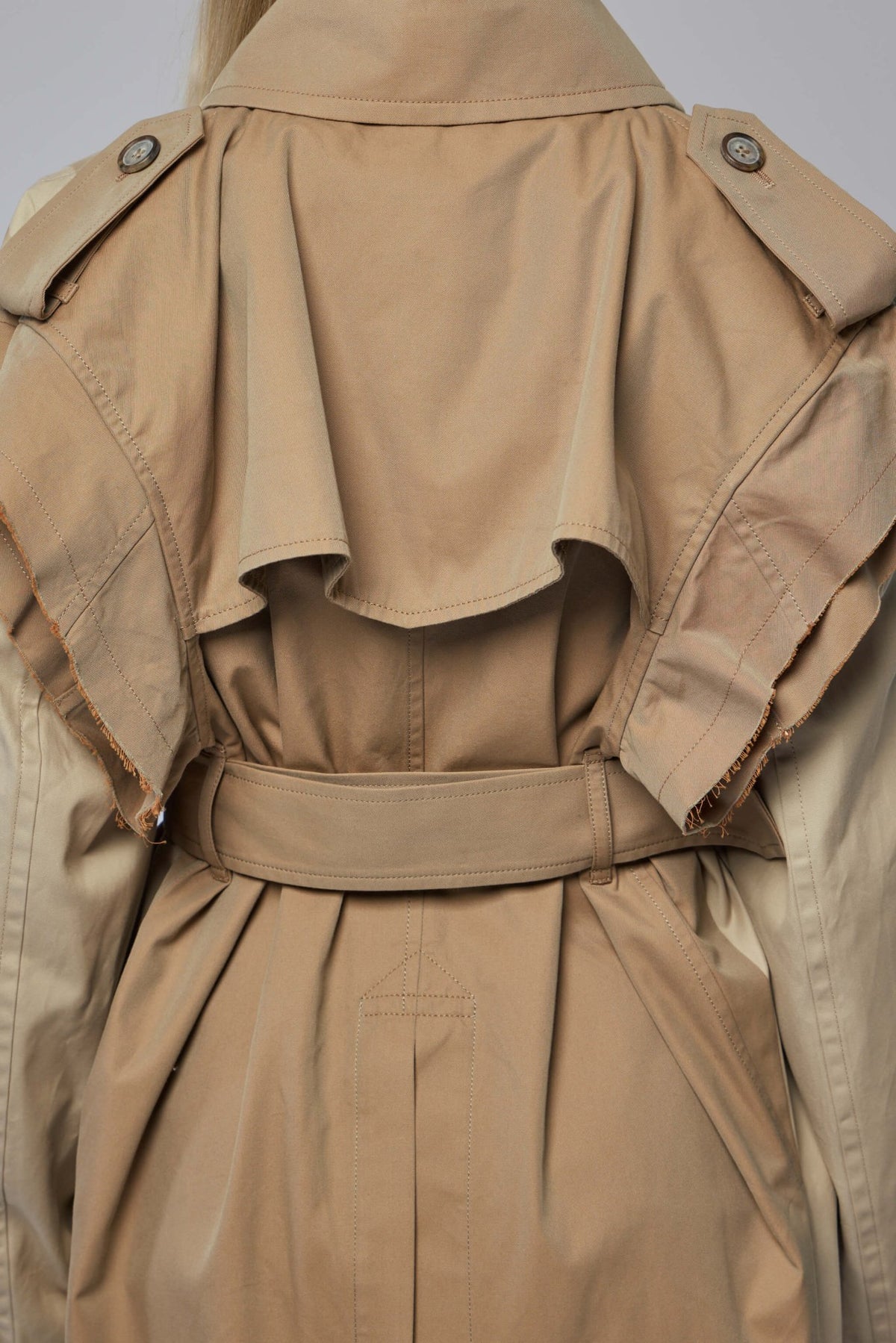 Full length view of model wearing oversized cotton coat