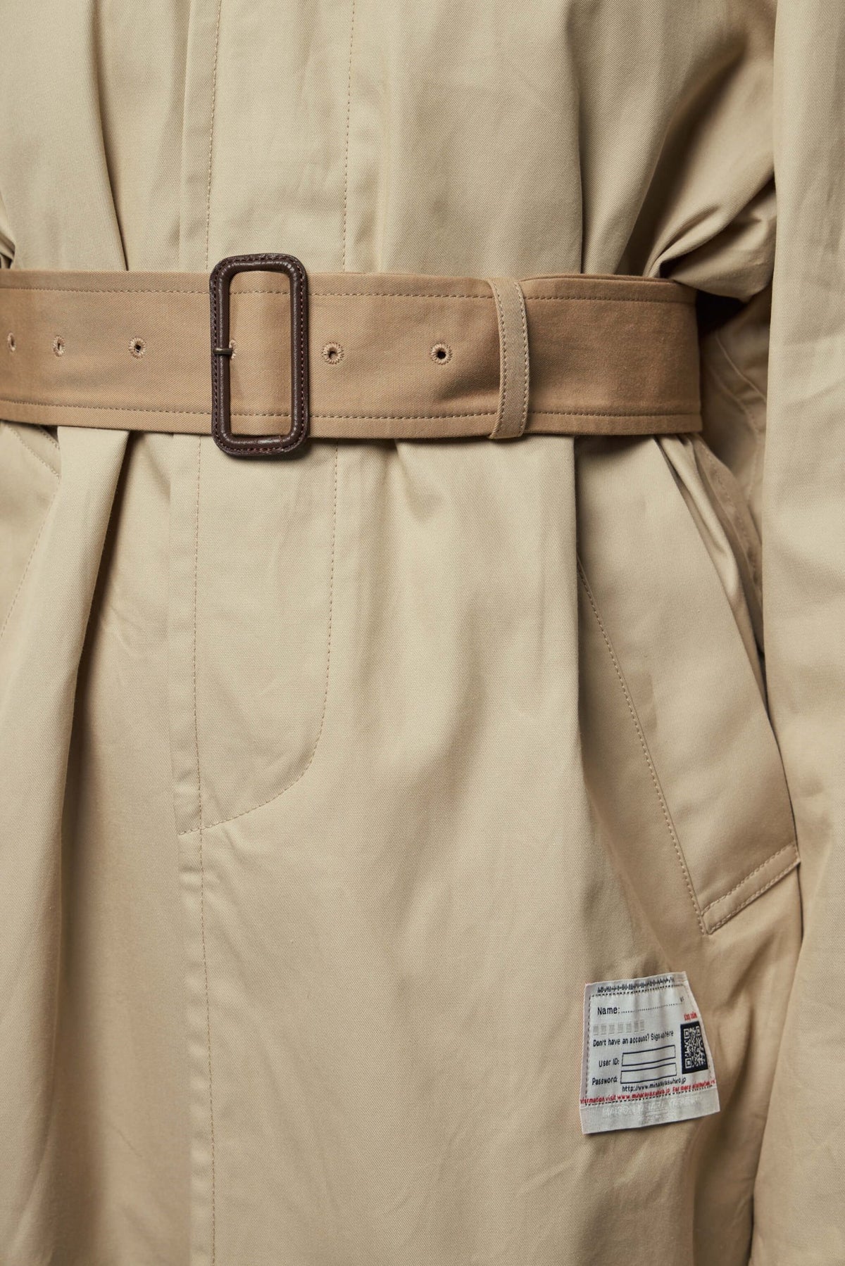 Back view of Maison Mihara Yasuhiro coat showing structured silhouette