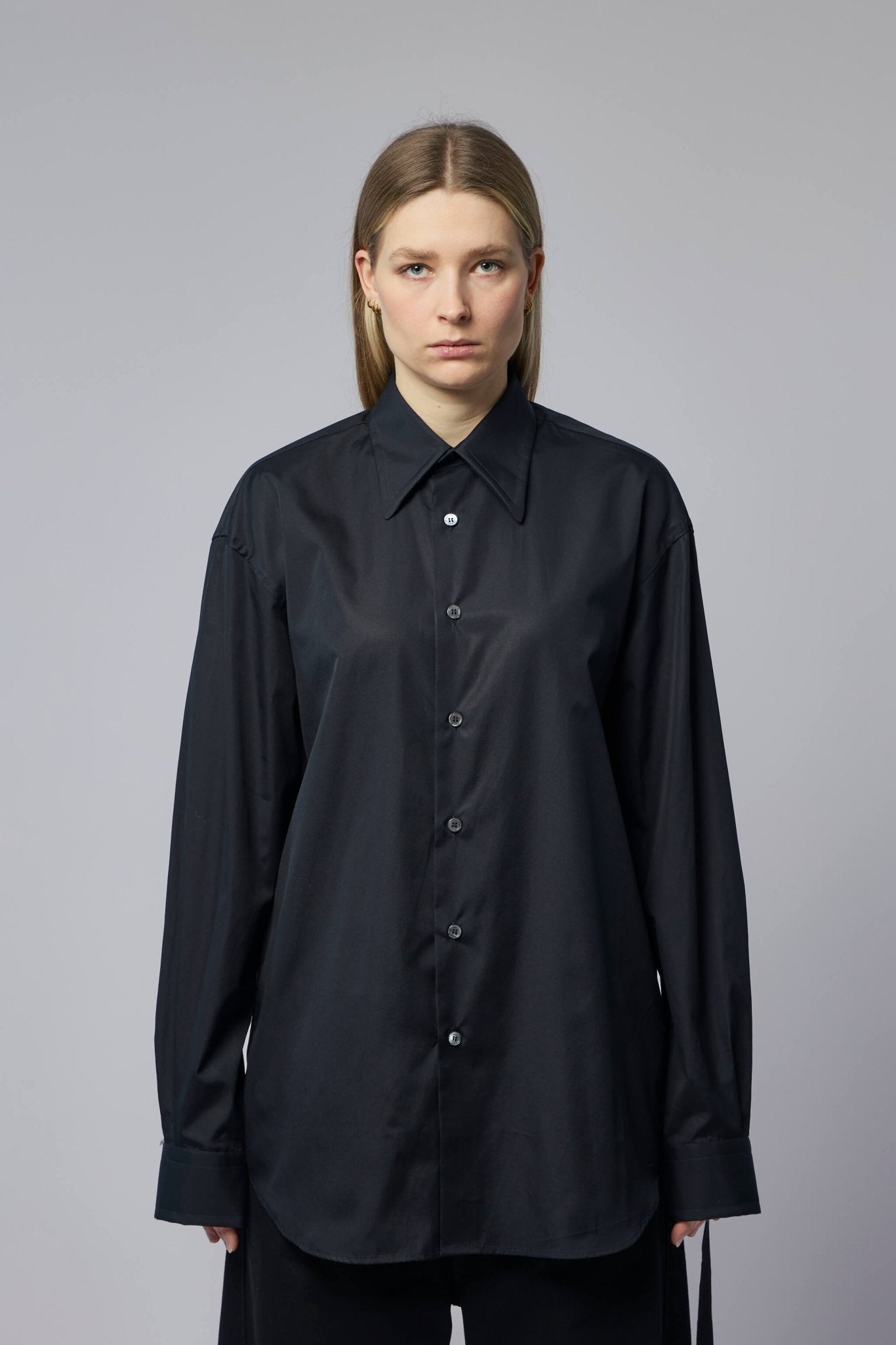 Marina Yee - Classic Shirt - LABELS — Close-up of Marina Yee shirt showing black button details and smooth cotton fabric