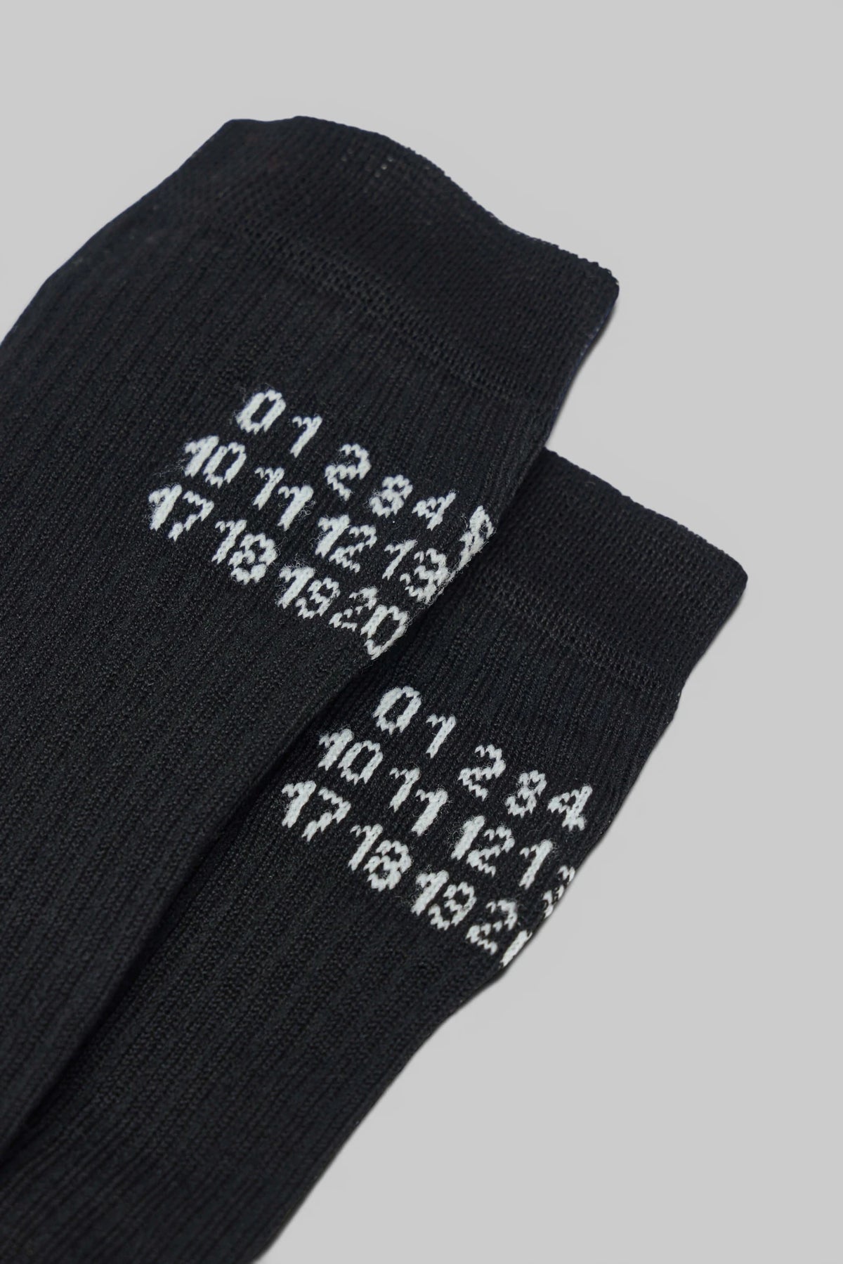 MM6 Margiela black socks styled with boots