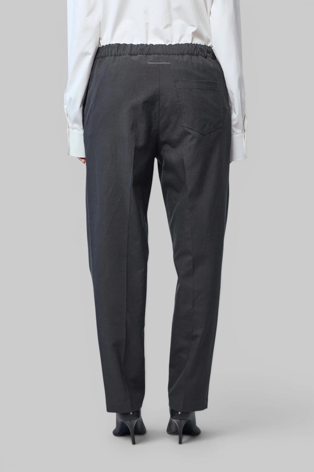 MM6 Margiela cargo pants paired with knitwear