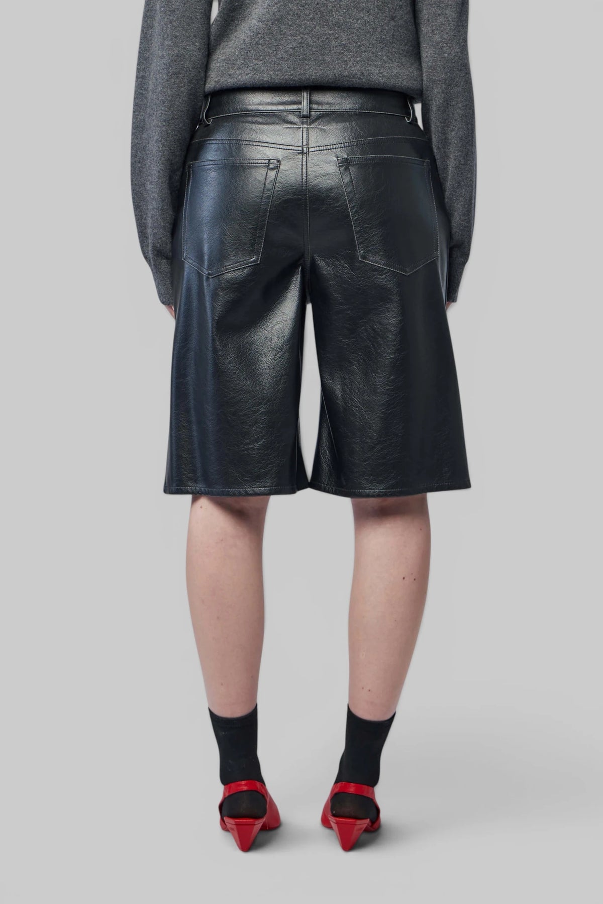 MM6 Margiela Shorts paired with structured outerwear