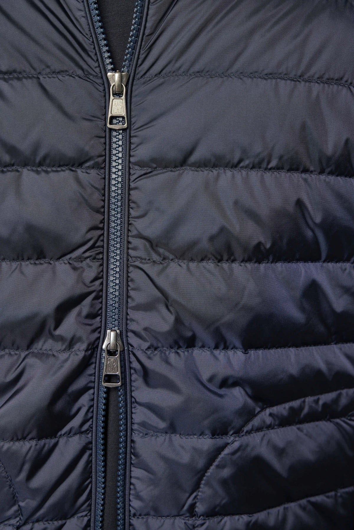 Moncler down cardigan worn with casual outfit
