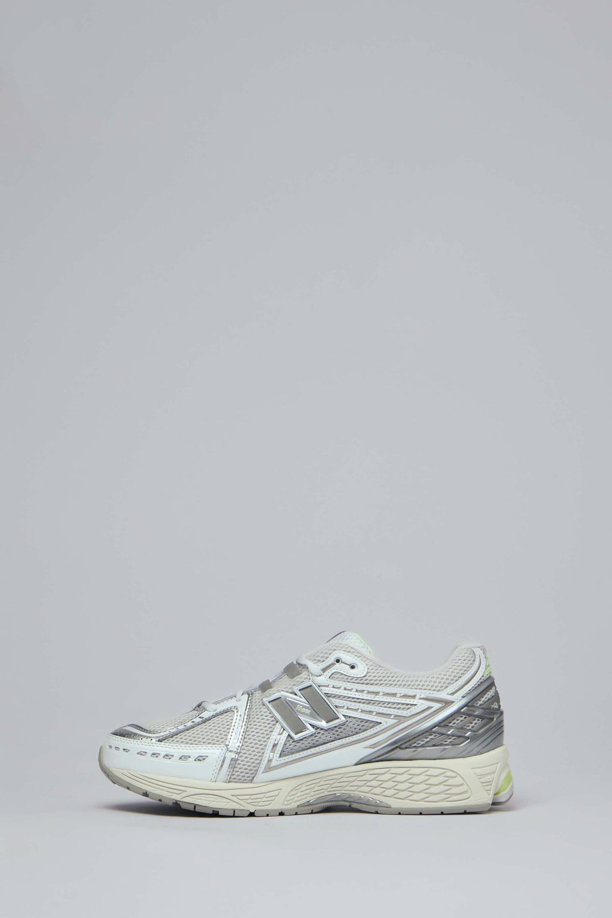 Close-up of mesh upper construction and synthetic overlays on 1906R