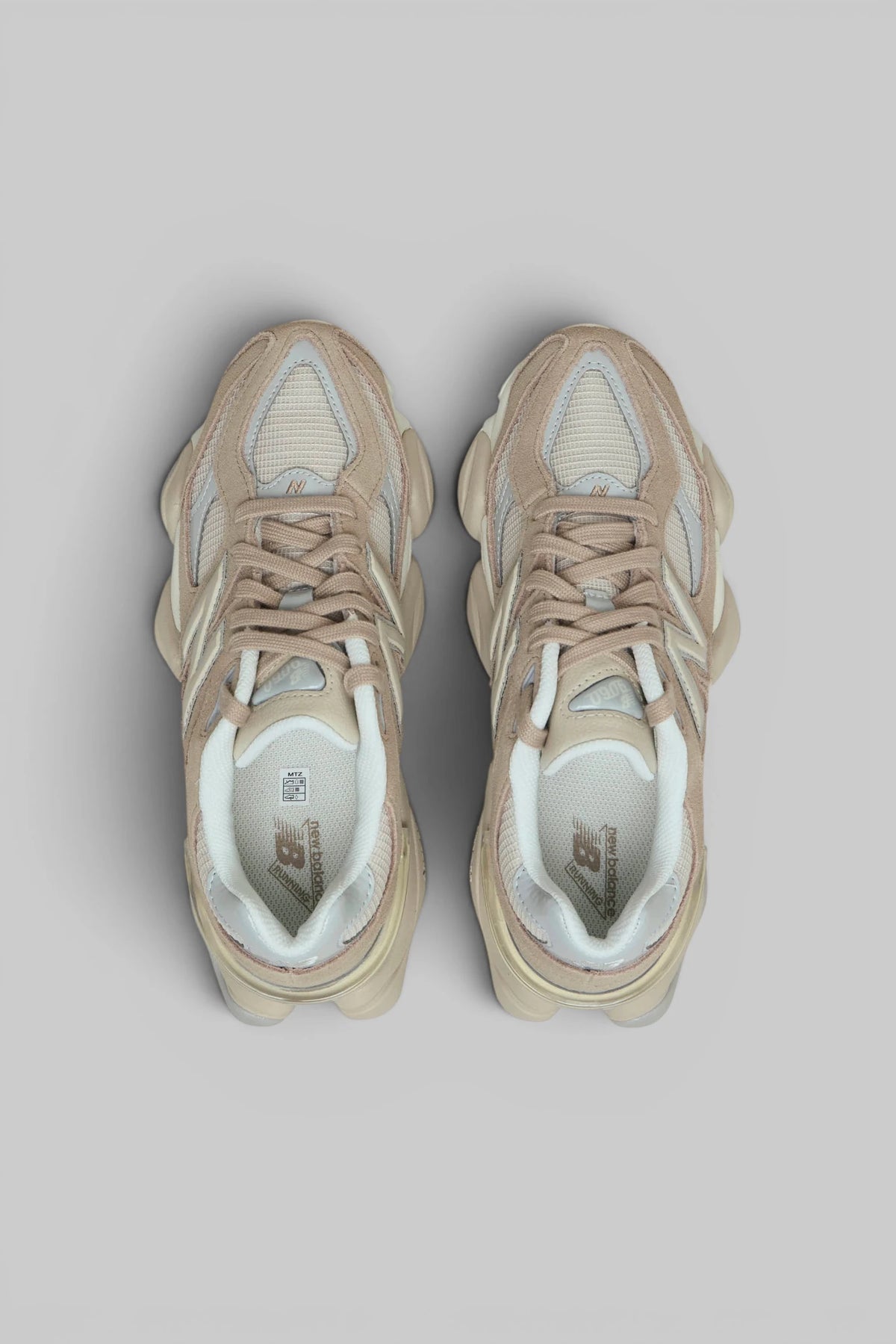 Close-up of suede overlay and branded side logo on New Balance 9060