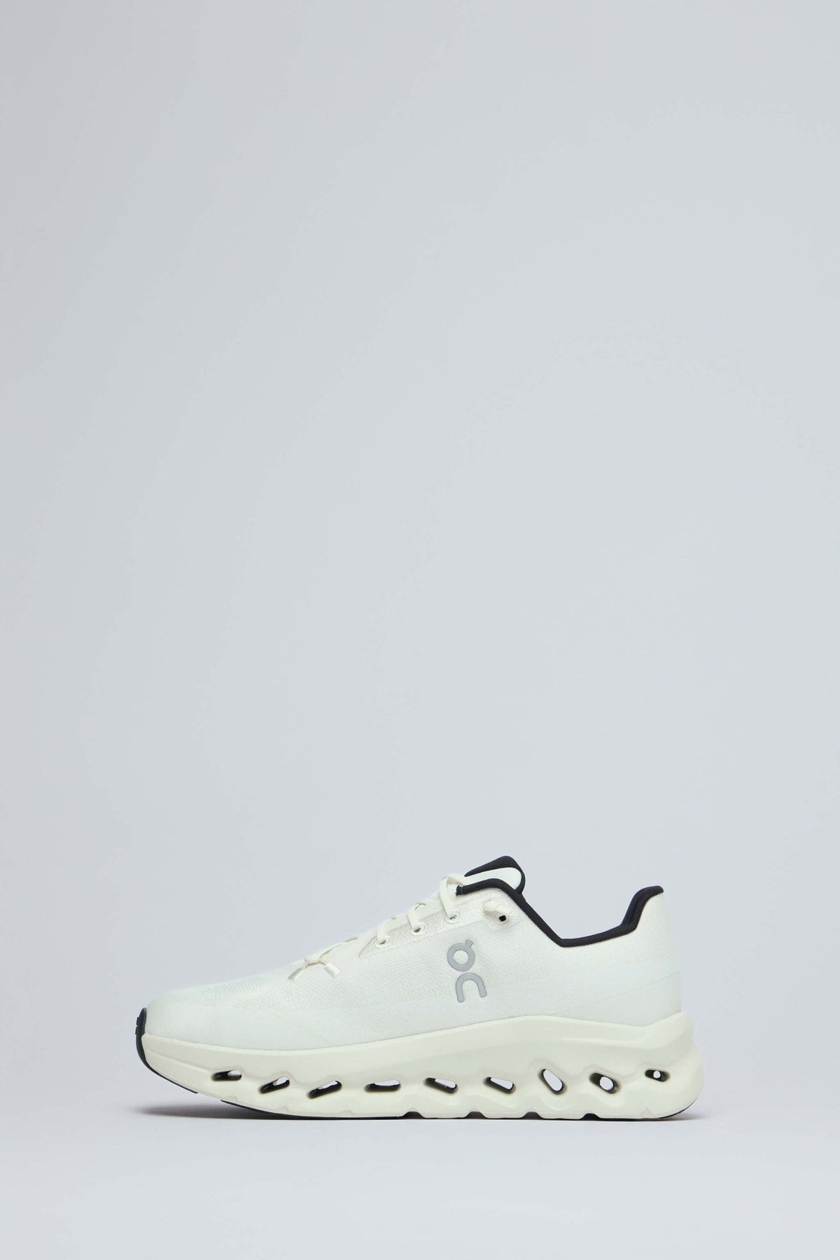 Close-up of recycled polyester mesh upper with ON Running logo branding