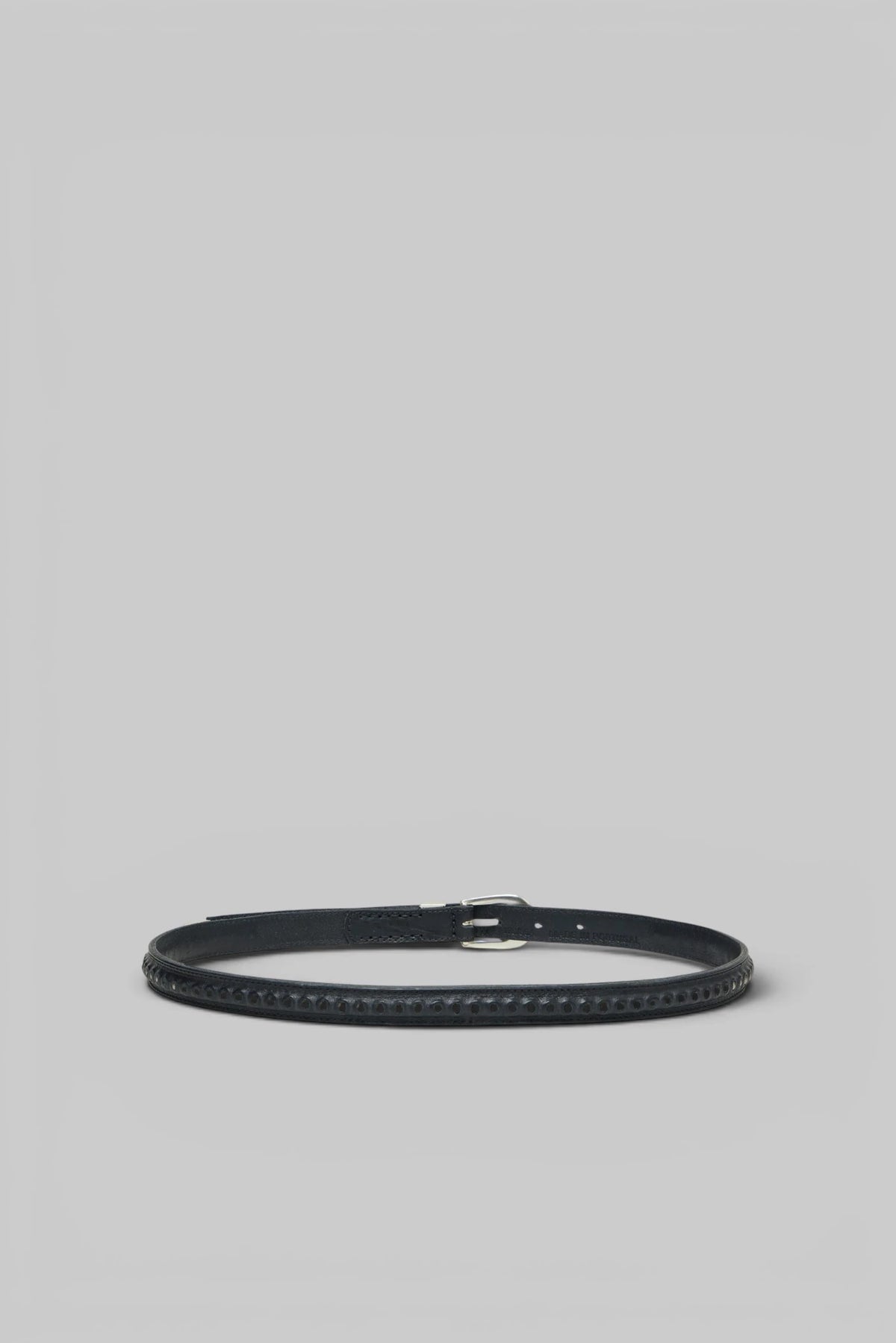 Close-up of the textured leather and stitch detailing on the Our Legacy Bullet Chain Belt