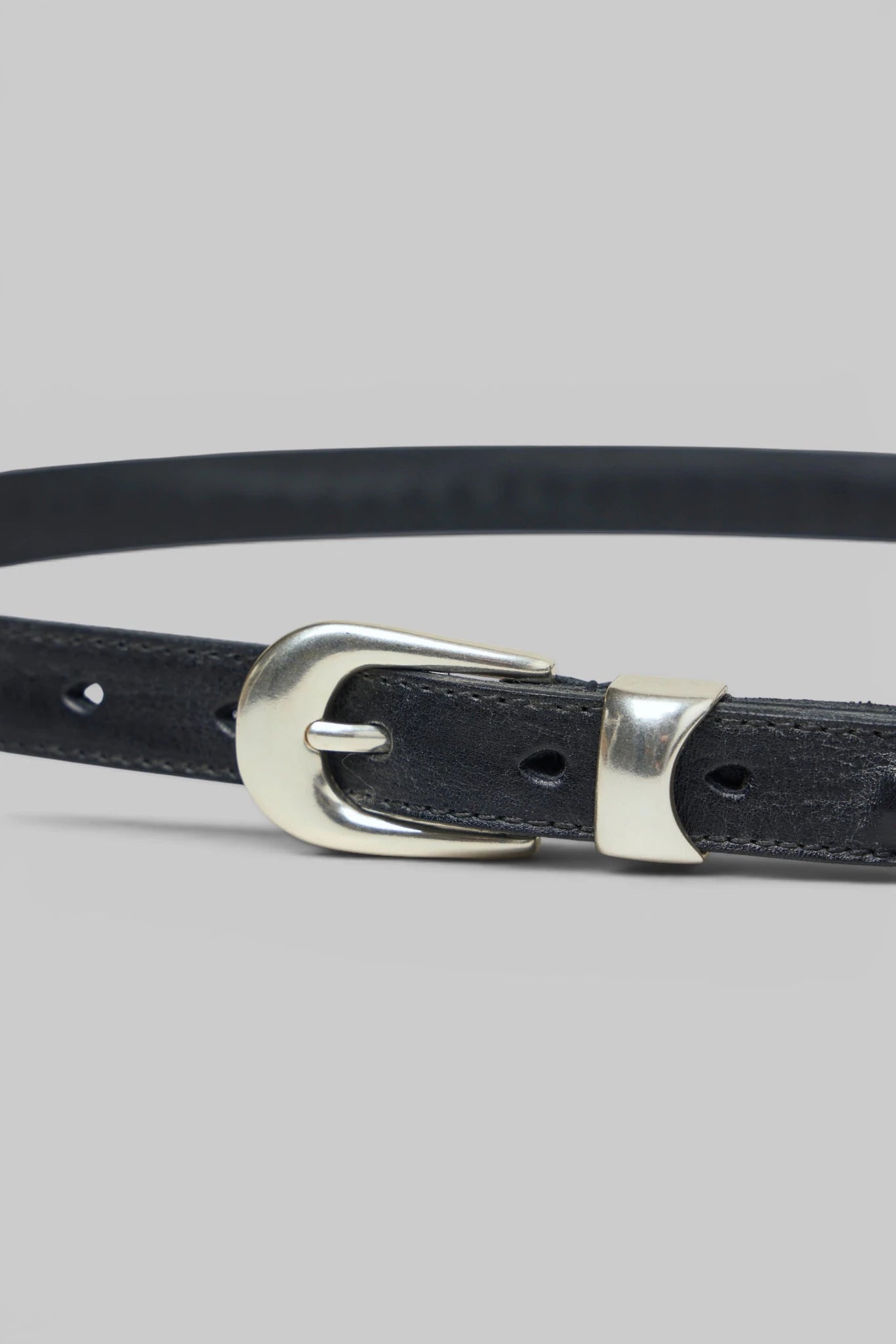 Silver buckle detail on the Our Legacy 2 Cm Bullet Chain Belt