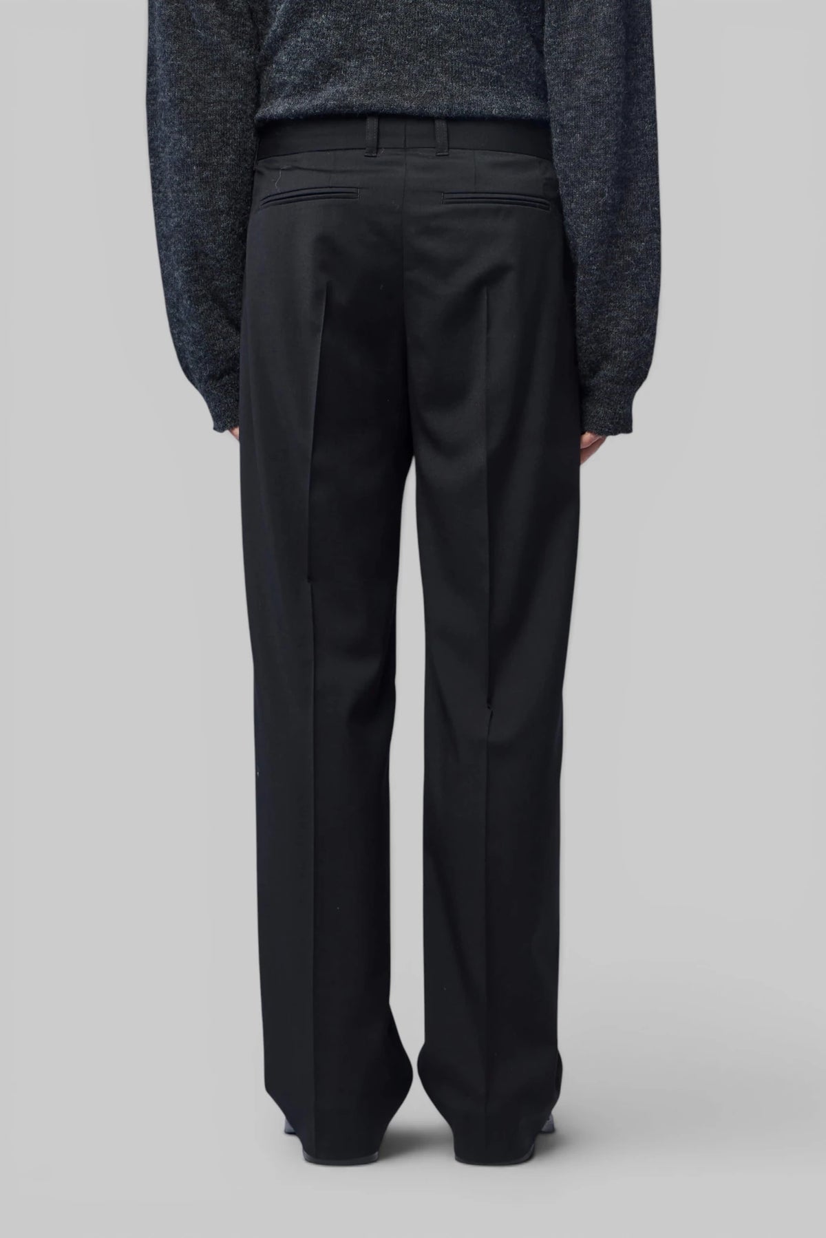 Back view of Our Legacy Slack Trouser tailoring