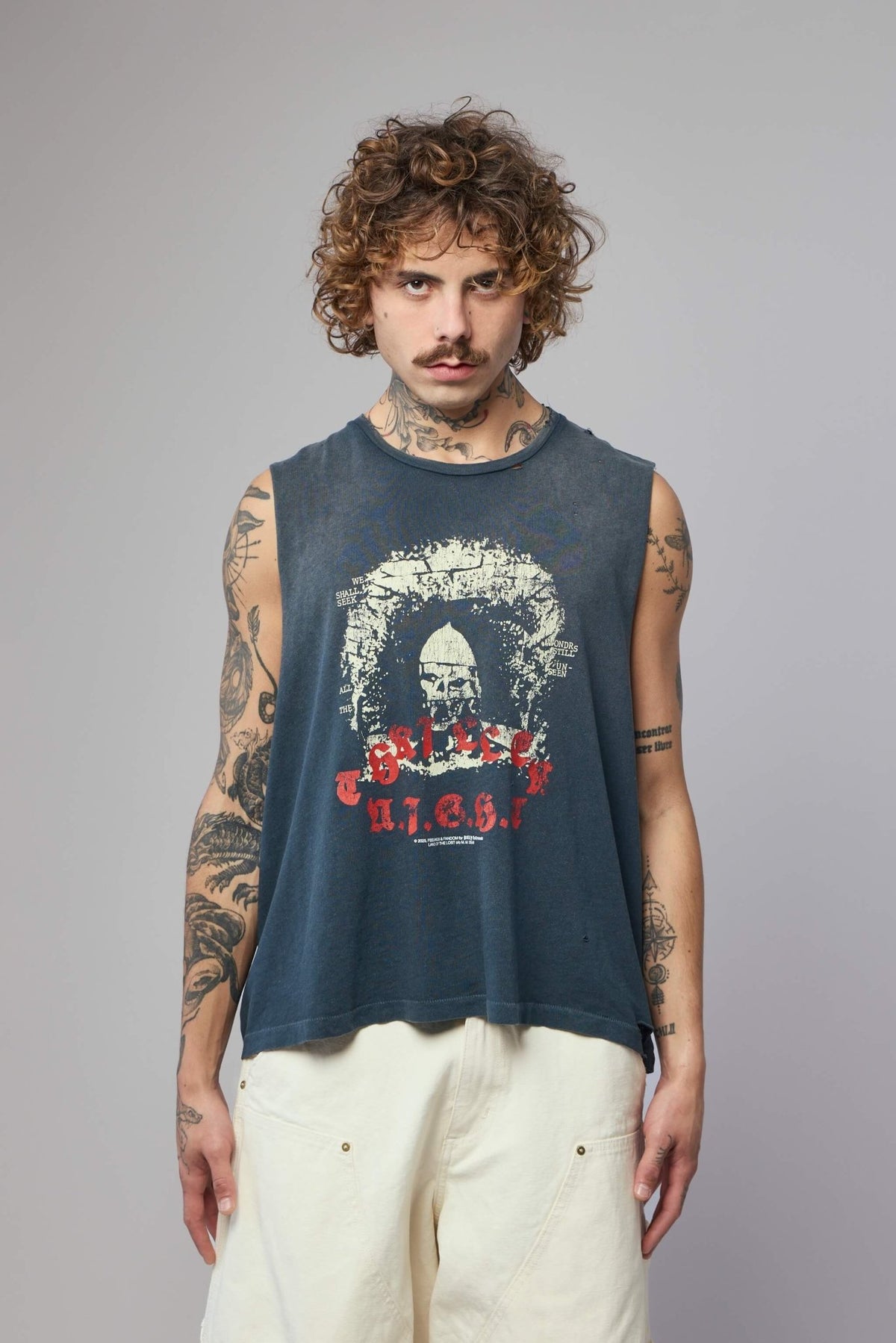 Close-up detail of Thriller Night Cut Off Tee showing cotton fabric texture and cut-off styling