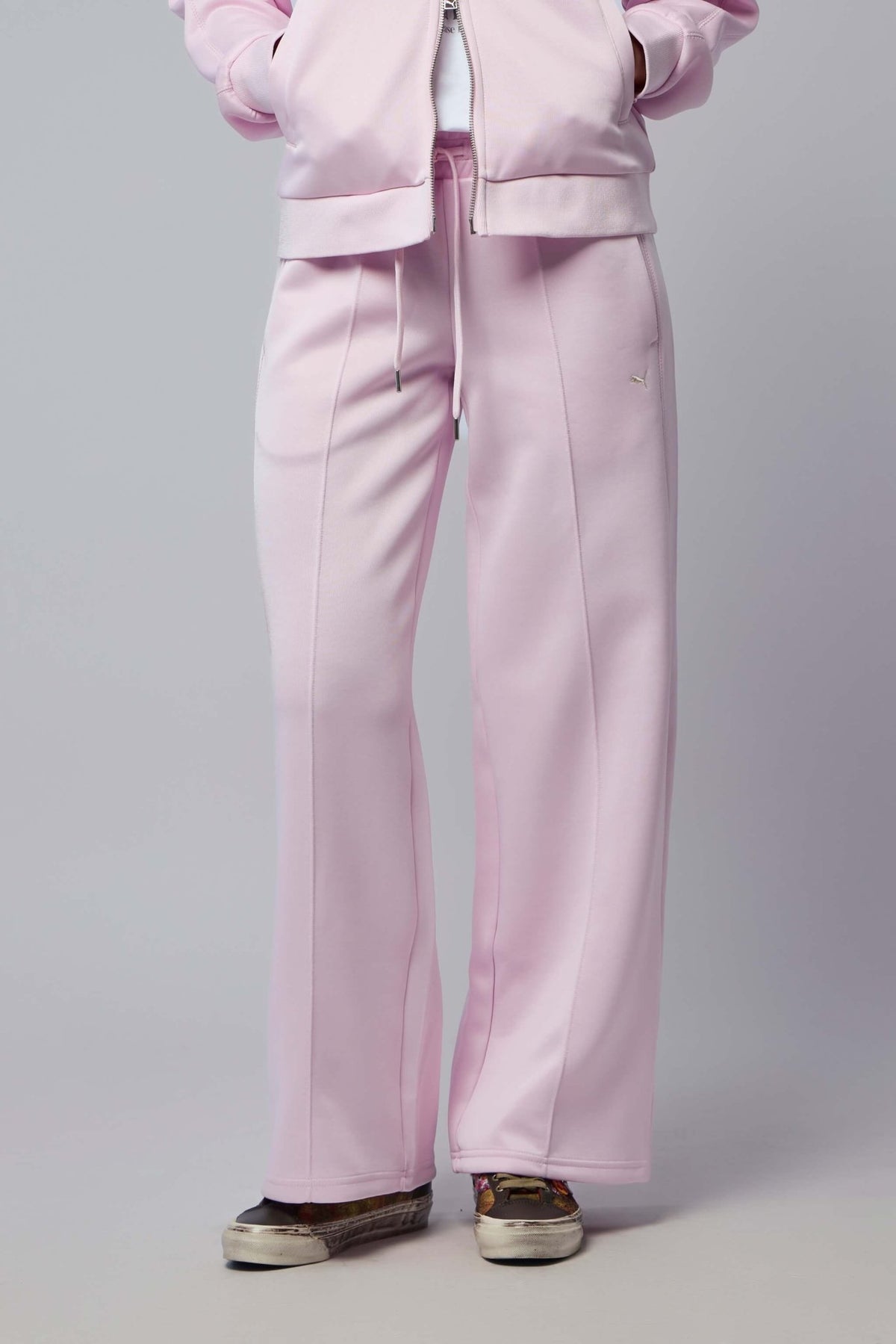 Puma Wide-Leg Pants in relaxed fit with drawstring waist and embroidered logo