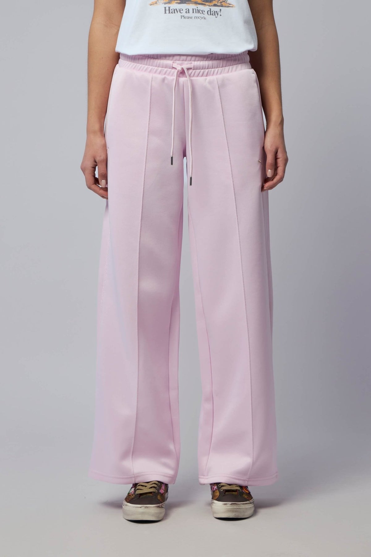 Close-up of Puma T7 track pants showing seam details and fabric texture