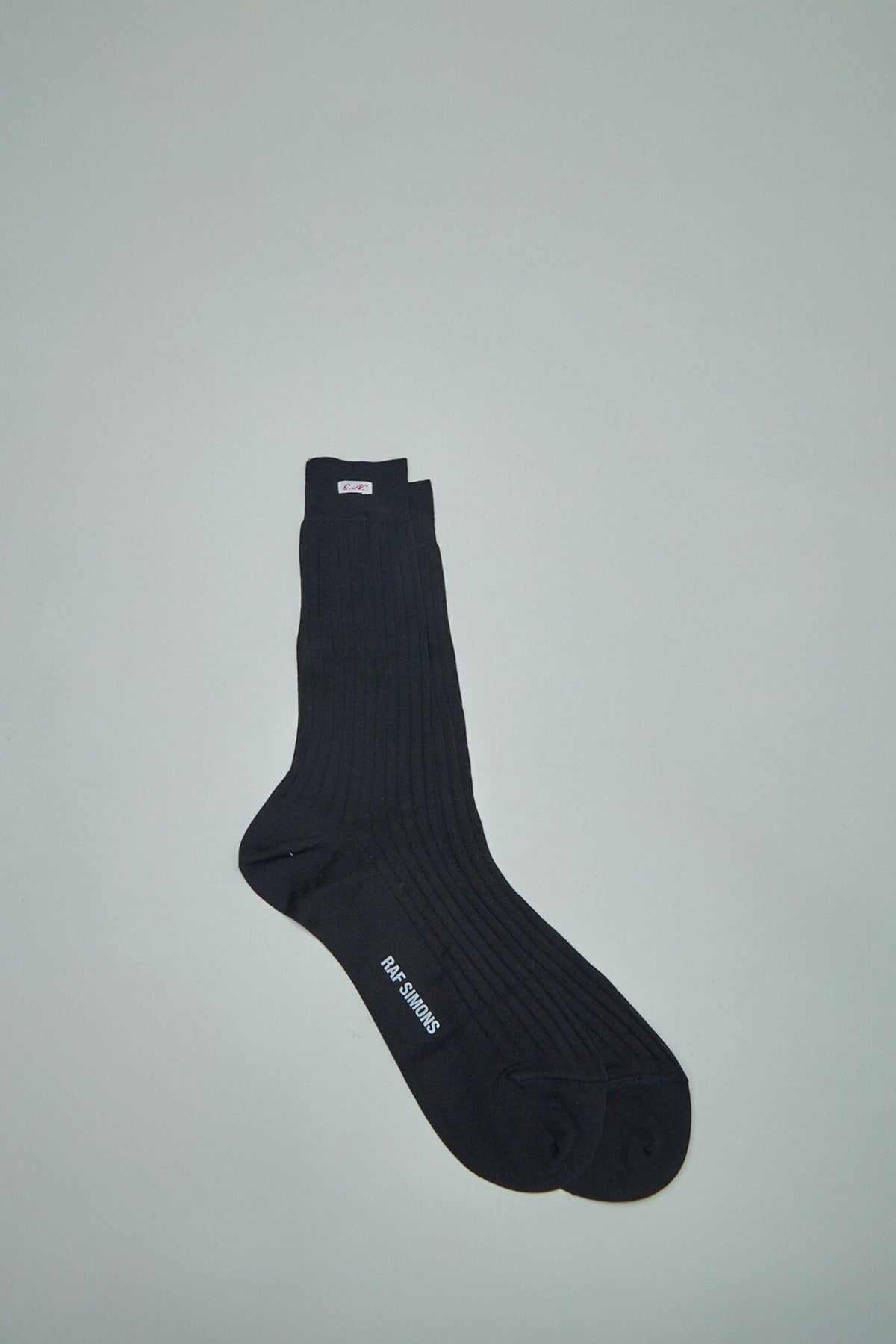 Raf Simons cotton socks with artists label detail in white