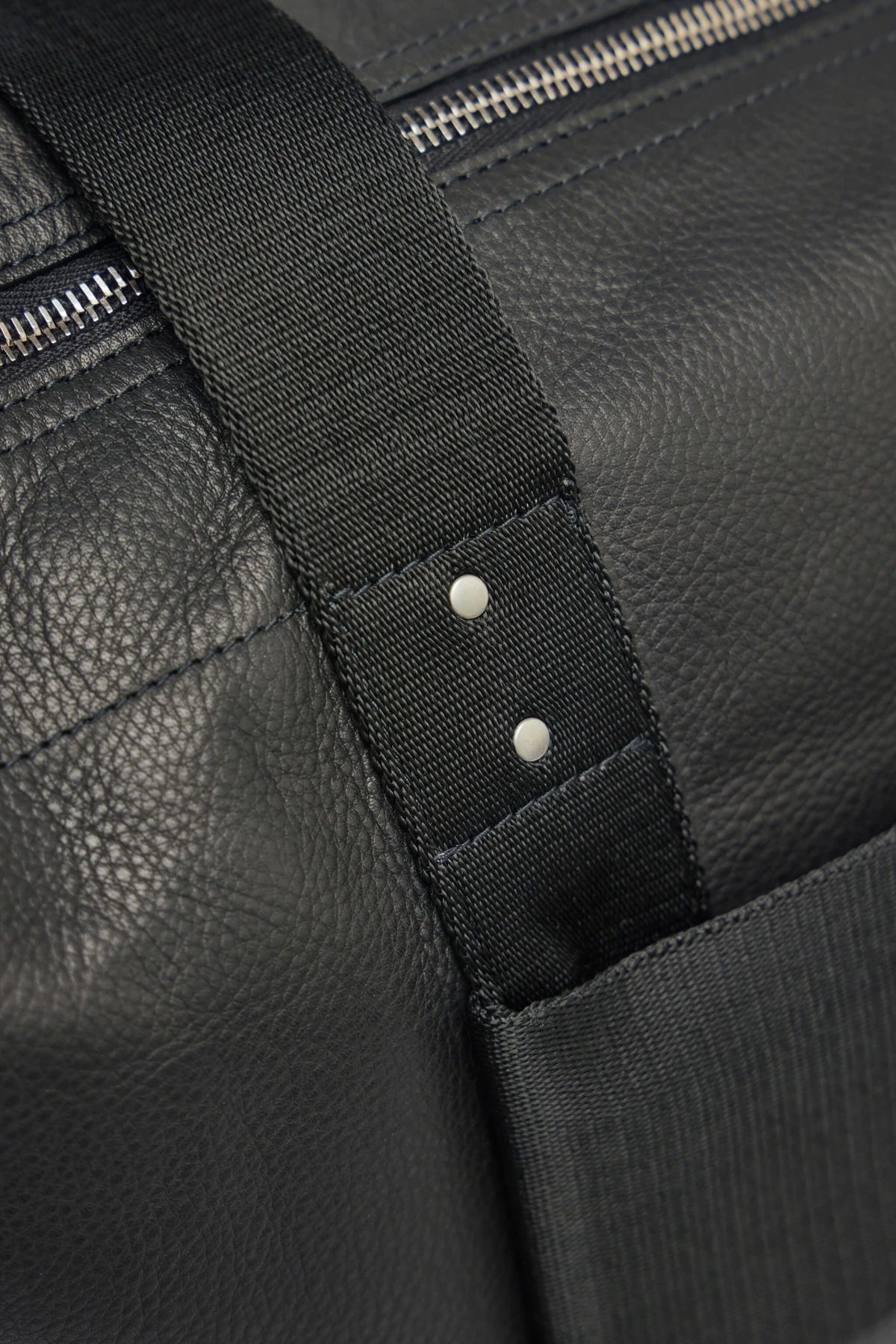Side profile of Rick Owens leather trolley tote bag